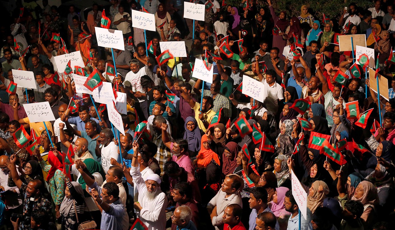 Opposition supporters protest against the government's delay in releasing their jailed leaders, including former president Mohamed Nasheed, despite a Supreme Court order, in Male, Maldives, on Sunday. Photo: Reuters