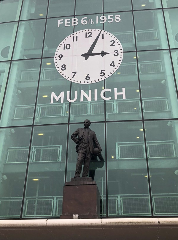 A view of the memorial clock above a statue of former Manchester United manager Matt Busby at Old Trafford ahead of a commemorative ceremony to mark the 60 year anniversary of the Munich Air Disaster. Photo: AP
