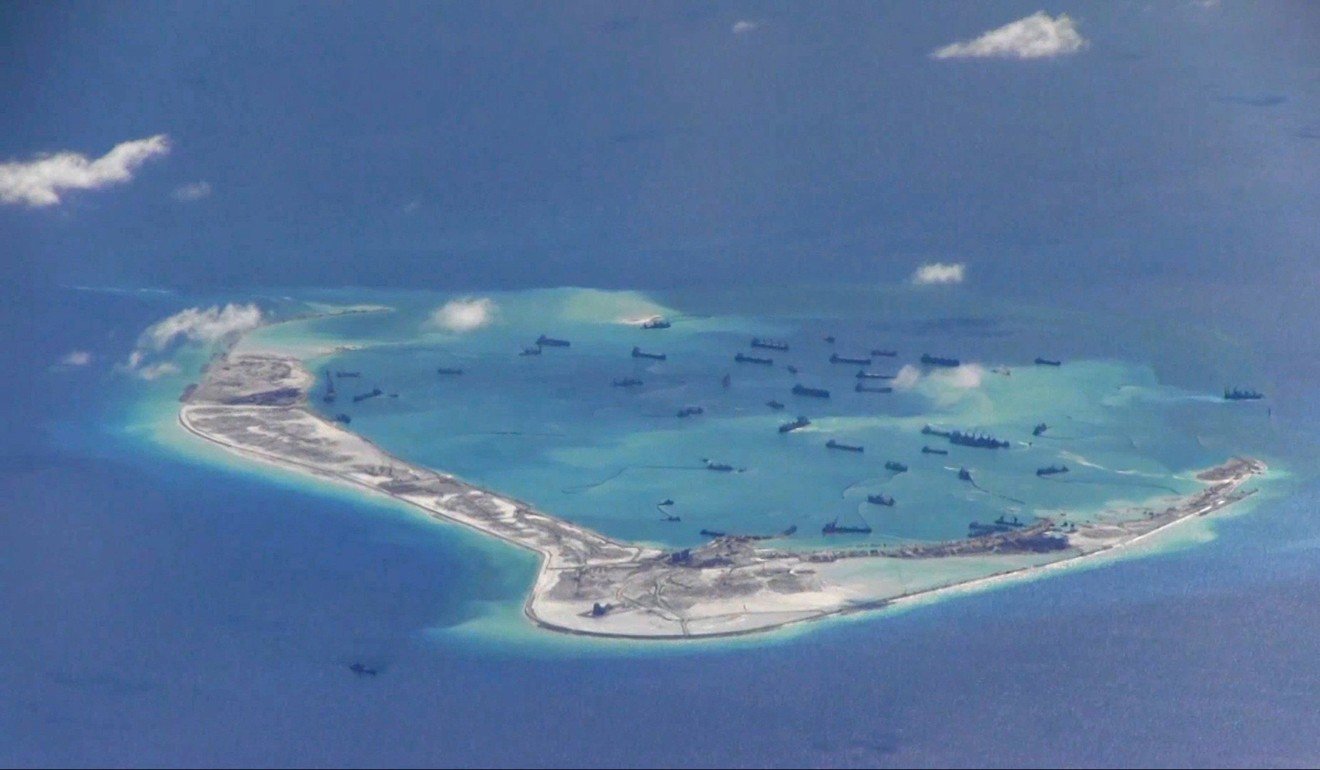 A file picture of Chinese dredging vessels in the waters around Mischief Reef in the disputed Spratly Islands in the South China Sea. Photo: Reuters
