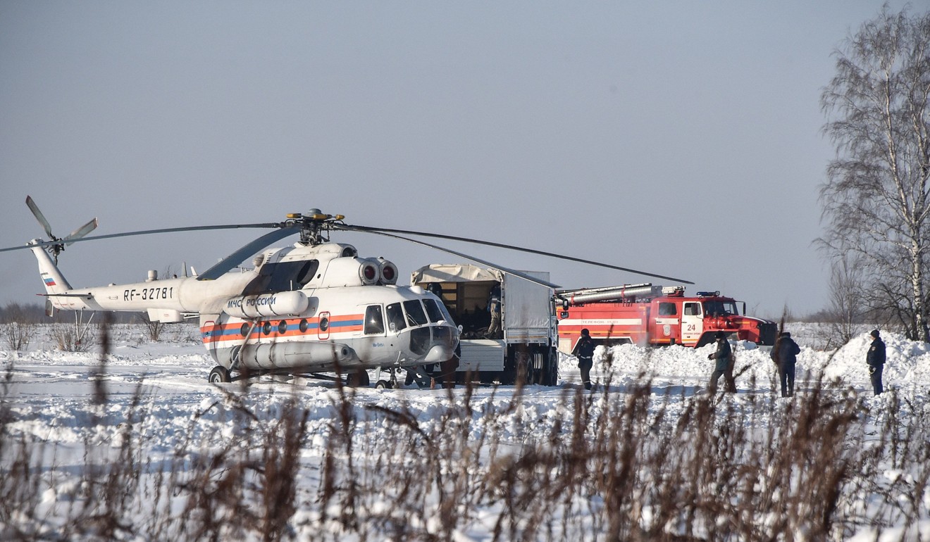 Rescuers at the site of the plane crash in Ramensky district. Photo” AFP
