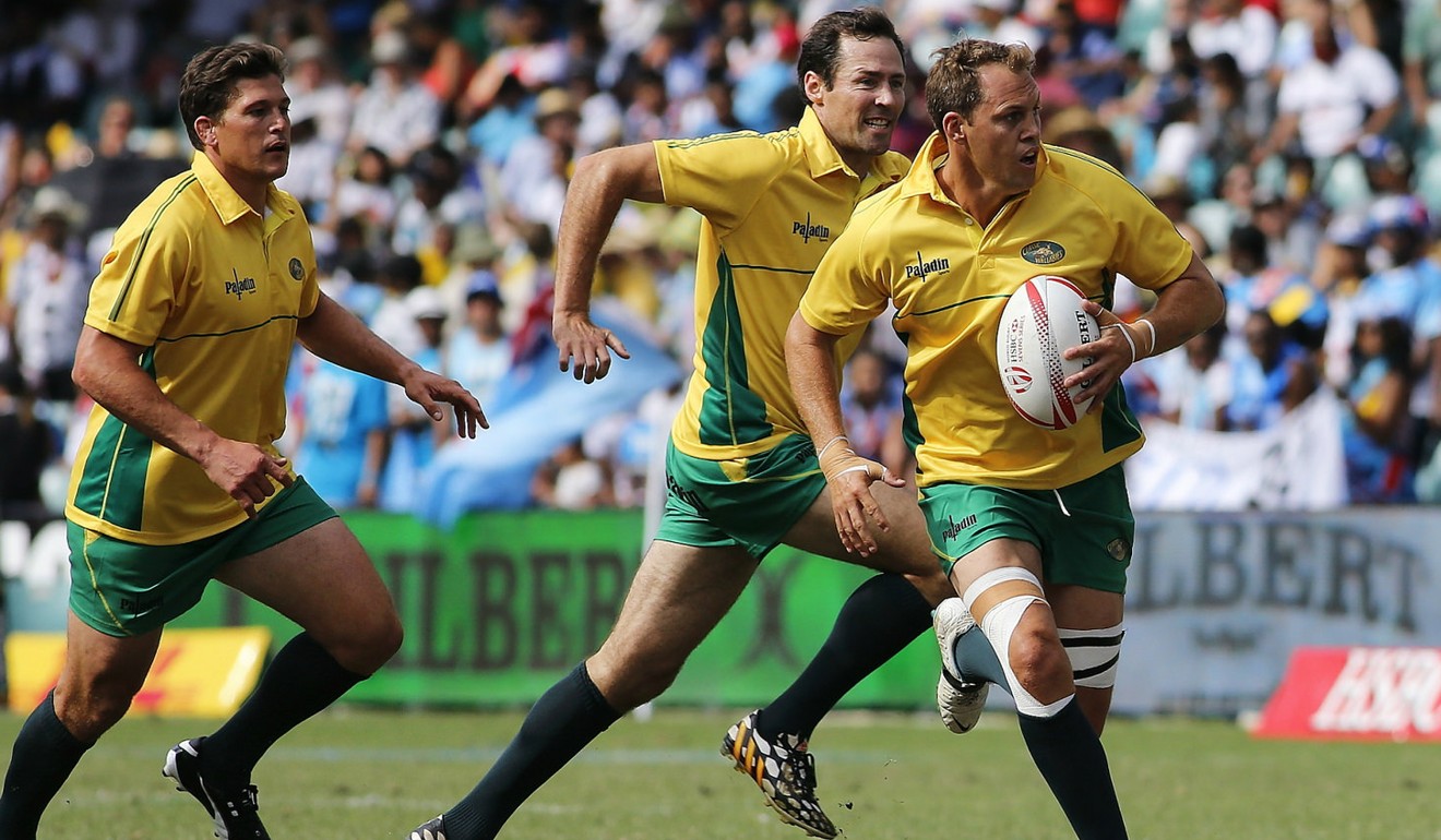 Stephen Hoiles carries for the Classic Wallabies. Photo: HKFC Tens