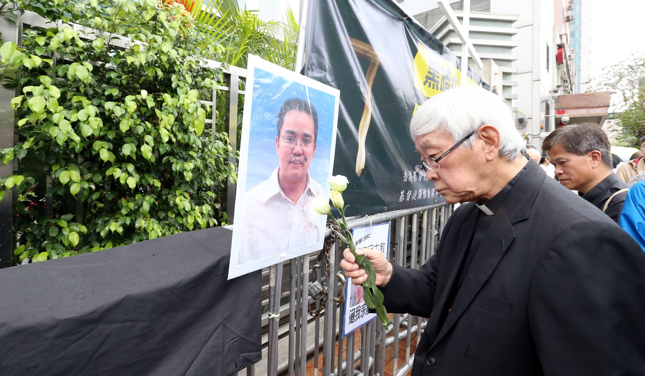 Chinese Cardinal of the Catholic Church Joseph Zen Ze-kiun with Local Catholics and Christians protest against removal of the Holy Cross from 2,000 mainland churches outside the Liaison Office in Western District in April last year. Photo: SCMP/ K. Y. Cheng