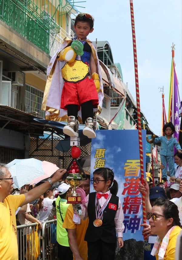 A child dresses as Ng On-yee at the Bun Festival in Cheung Chau. Photo: K. Y. Cheng