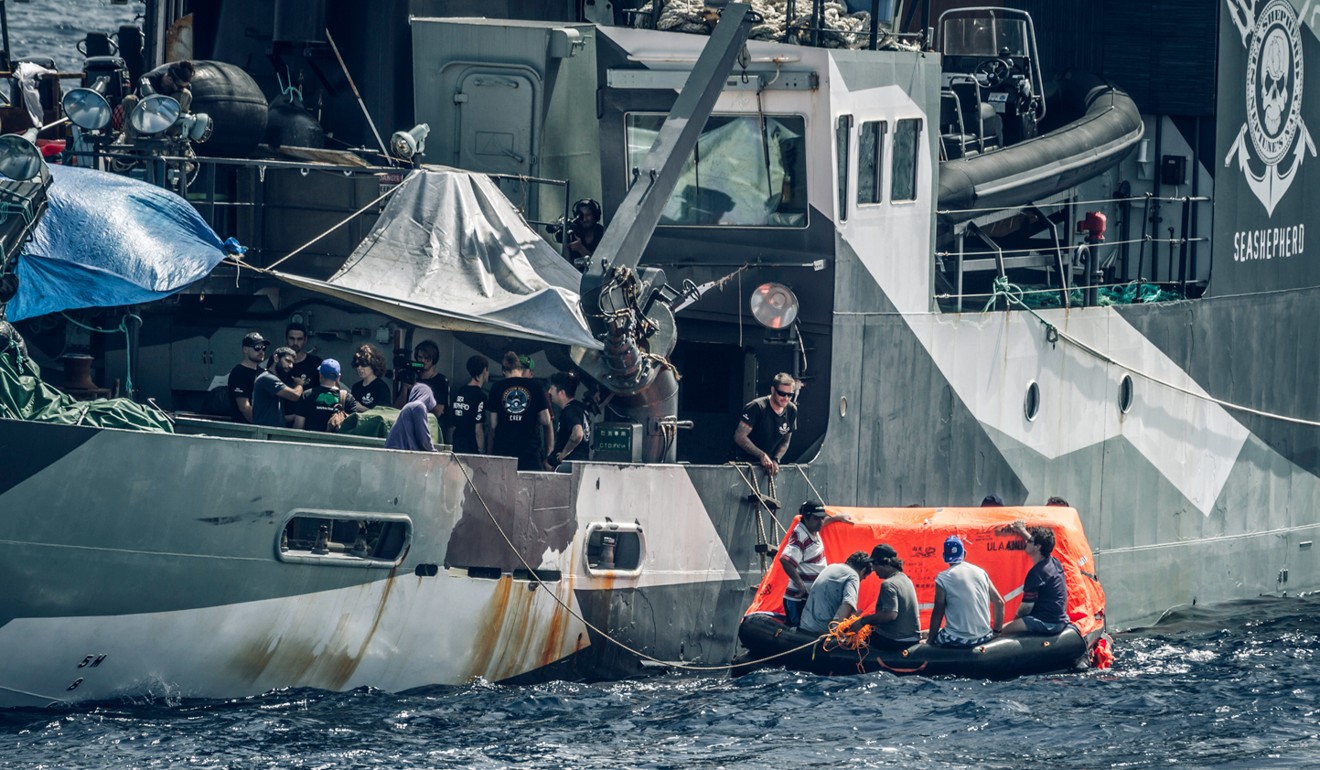 The Sam Simon rescues the crew of the Thunder. Picture: Simon Ager/Sea Shepherd