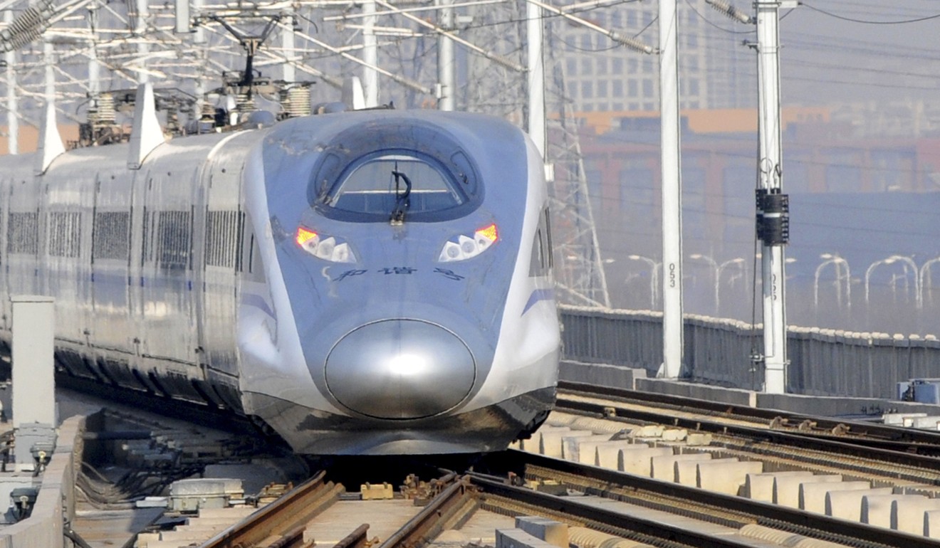 A bullet train pulls out of Tianjin South Railway Station in Tianjin, north China. Photo: Xinhua