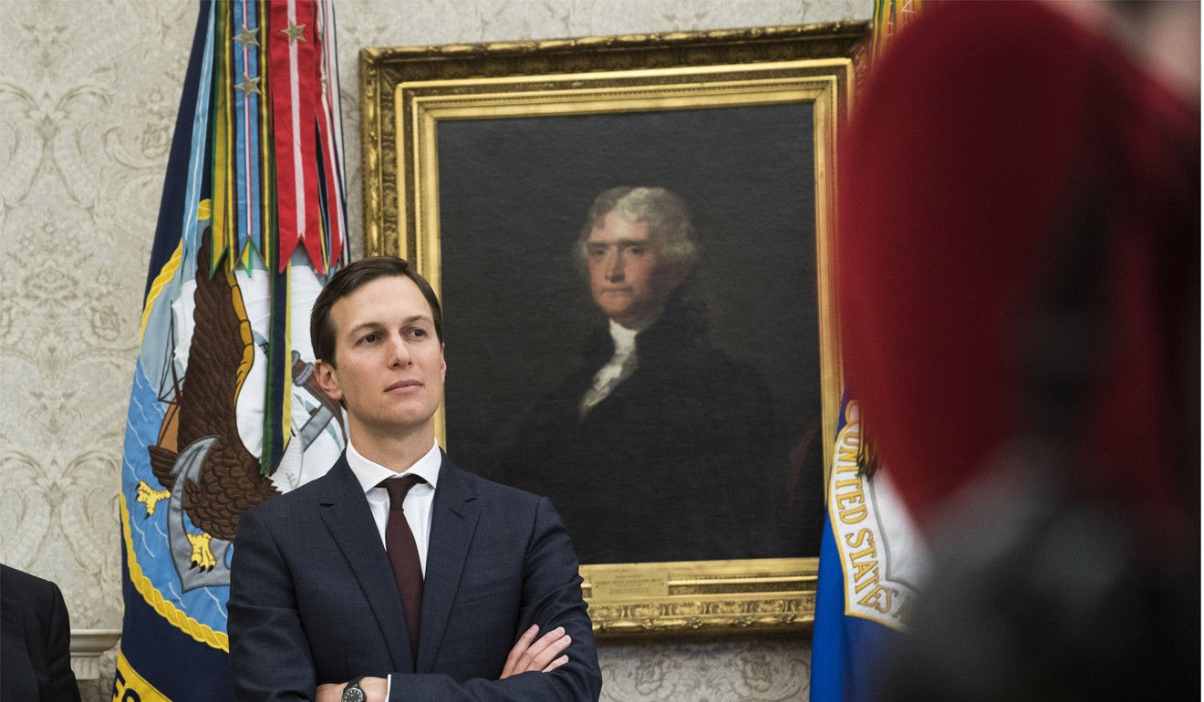 White House adviser Jared Kushner watches as President Donald Trump signs an executive order in the Oval Office at the White House on January 9. Photo: Washington Post / Jabin Botsford