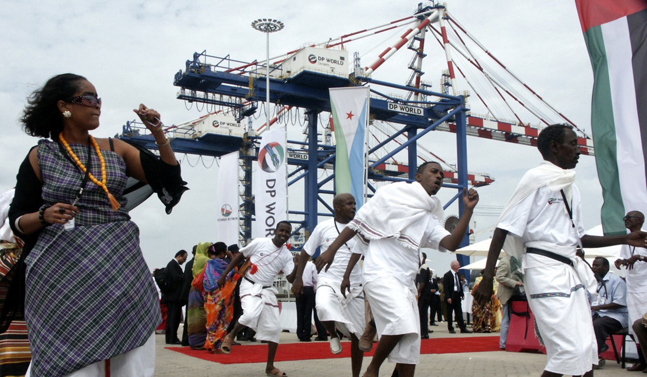 In this February 7, 2009 file photo, Djibouti men and women dance during the opening ceremony of Dubai-based port operator DP World's Doraleh container terminal in Djibouti Photo: AP
