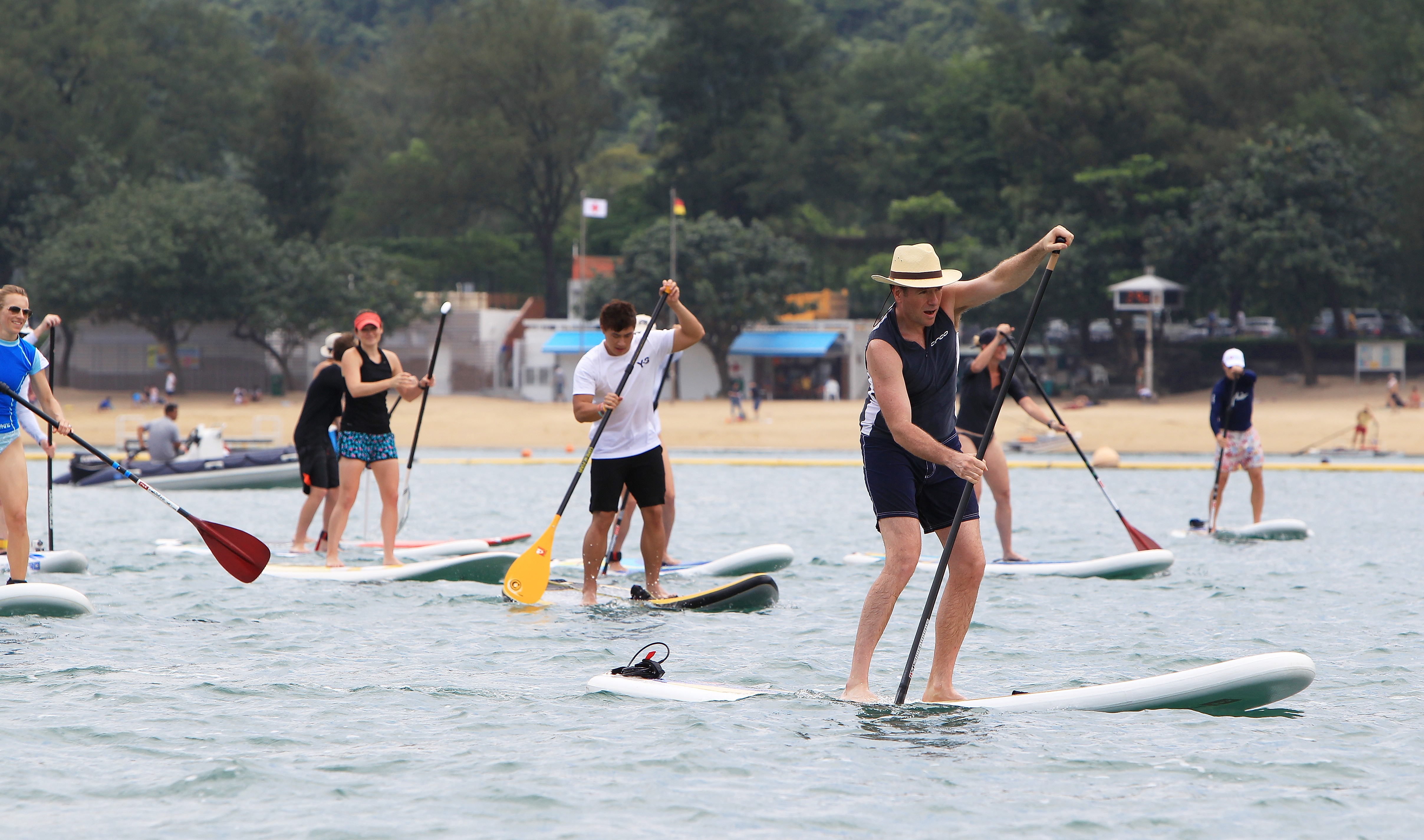 Stand-up paddlers participate in an event held at the Victoria Recreation Club in Deep Water Bay. The club is a base for outrigger canoeing, dragon boating and paddle boarding. Photo: Jonathan Wong