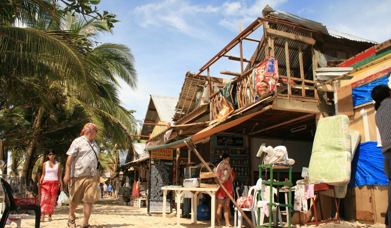 A storm-damaged shop on Boracay. Picture: AFP
