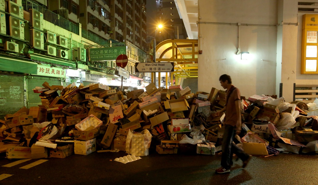 Cardboard cartons dumped on the roadside in Wan Chai. Photo: Edmond So