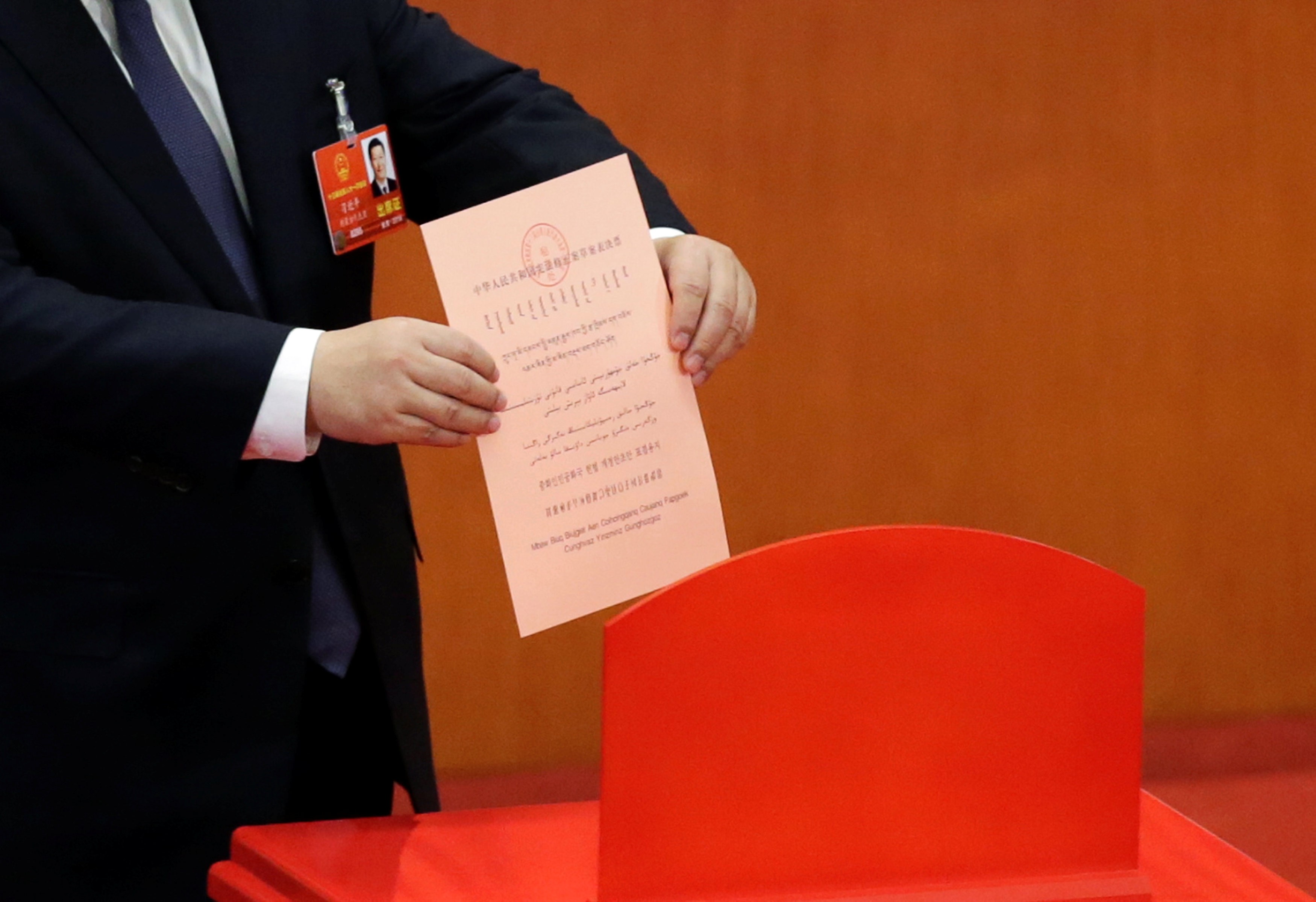 Chinese President Xi Jinping submits his ballot during the vote on changes to the constitution at the National People’s Congress at the Great Hall of the People in Beijing. Photo: Reuters