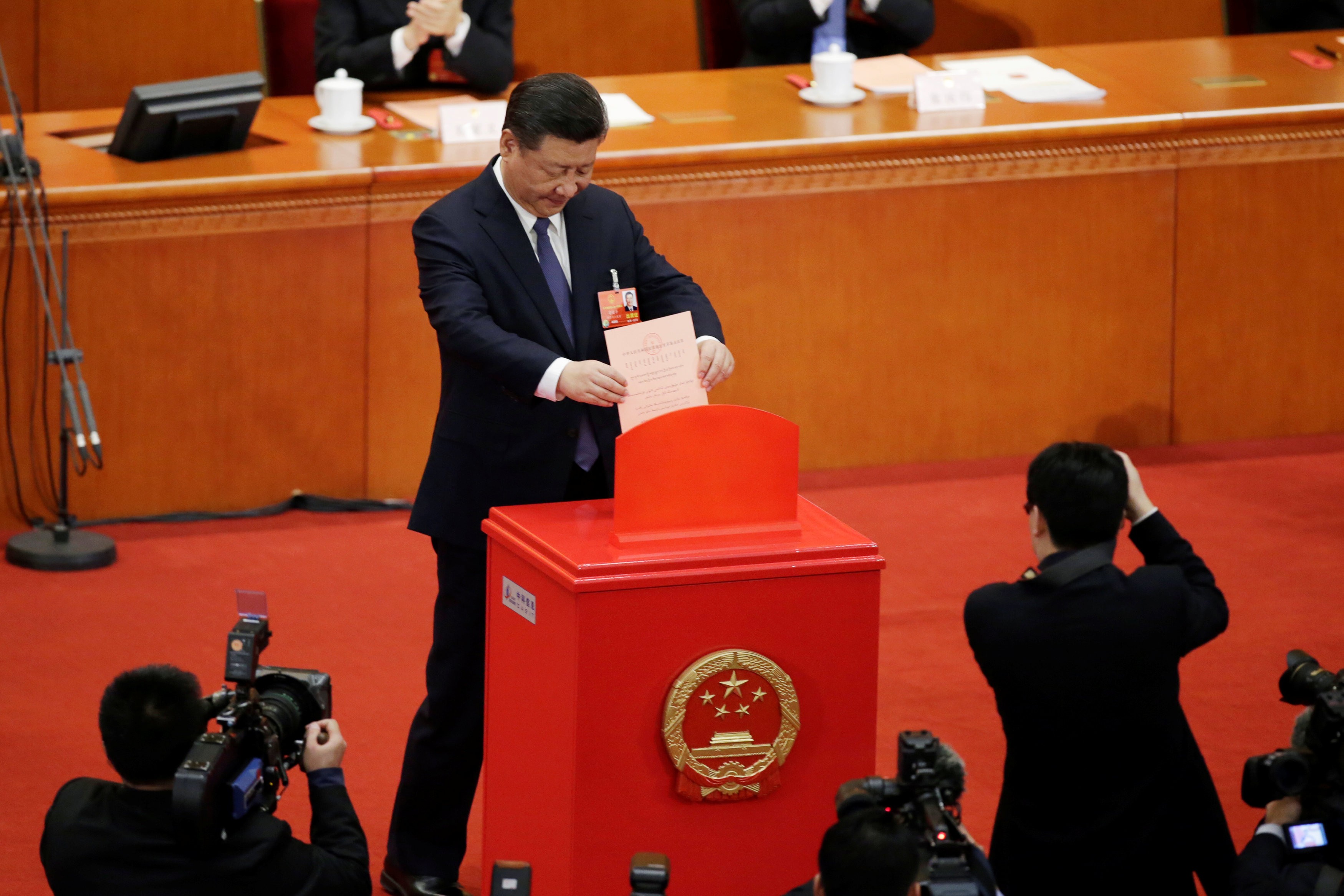 President Xi Jinping casts his ballot in Beijing on Sunday in a vote on constitutional revisions that removed the presidential term limit, among other changes. Photo: Reuters