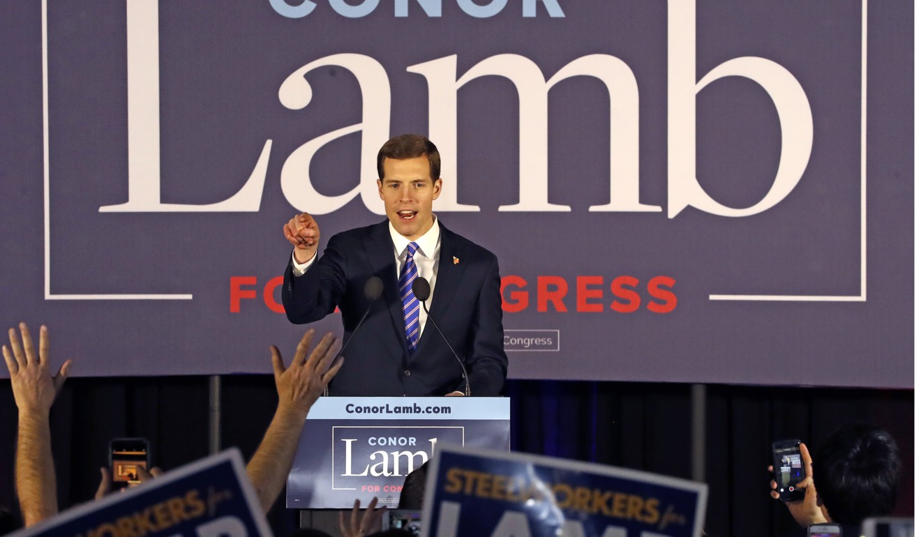 Conor Lamb, the Democratic candidate for the March 13 special election in Pennsylvania's 18th Congressional District celebrates with his supporters at his election night party in Canonsburg early Wednesday. Photo: AP