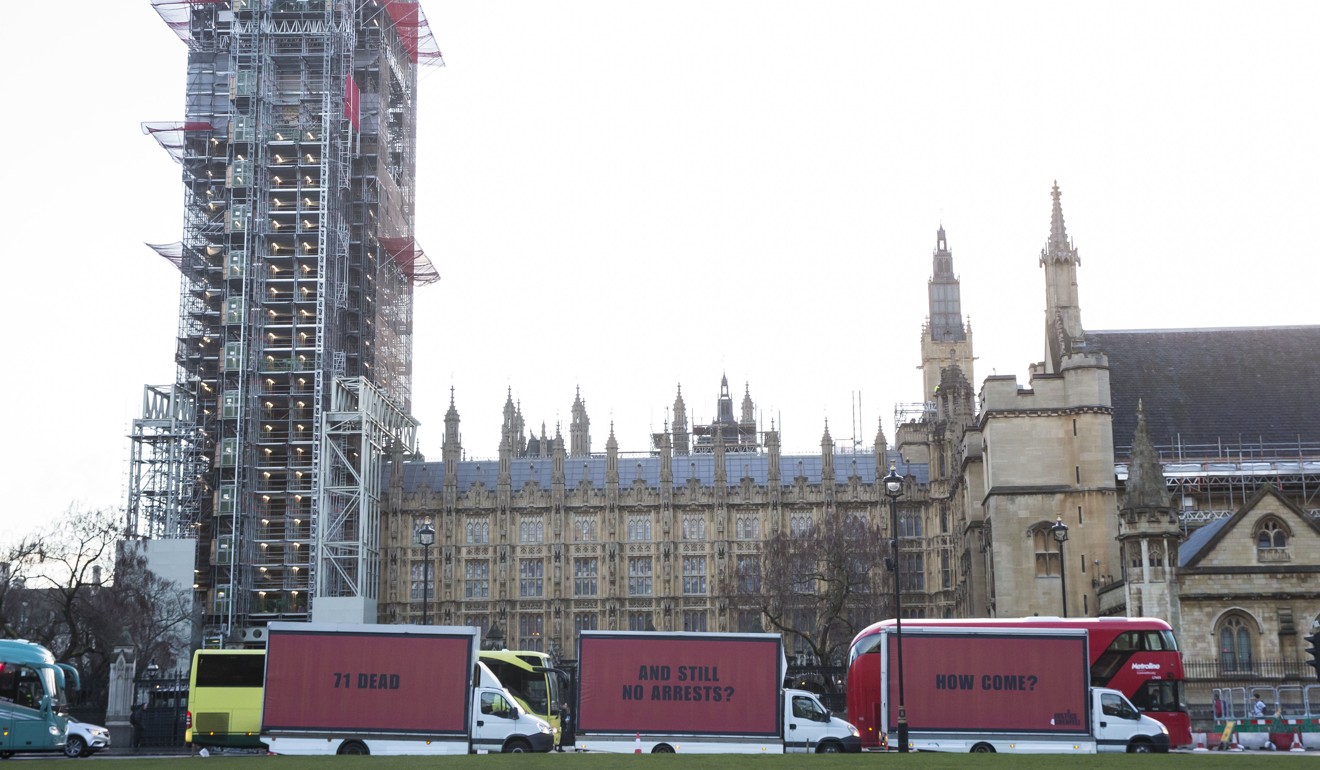 The Community-led organisation, Justice4Grenfell, parades three billboards past the Houses of Parliament in London on February 14, 2018, calling for justice for victims of the June 14, 2017, deadly apartment fire. Photo: Justice4Grenfell via AP