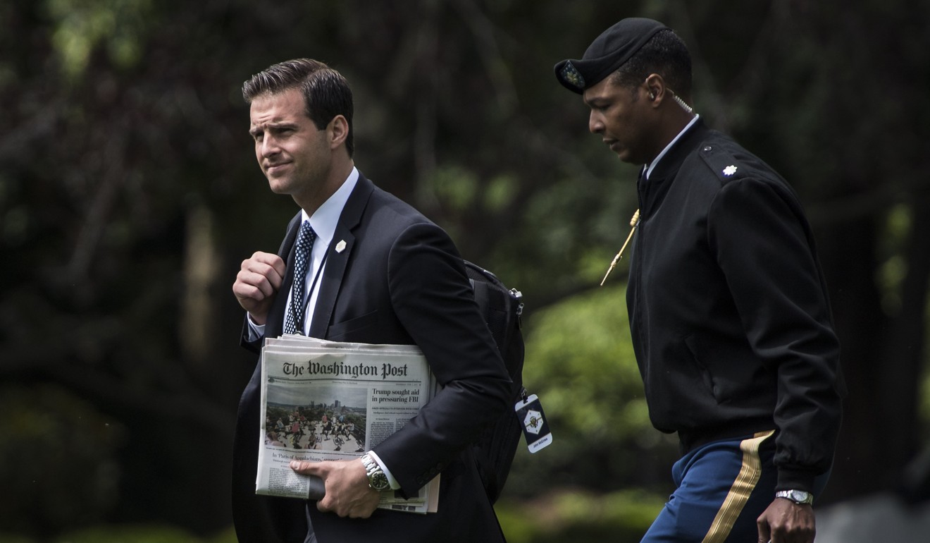 Trump aide John McEntee (left) was stripped of his security clearance and escorted from the White House after his dismissal. Photo: Washington Post by Jabin Botsford