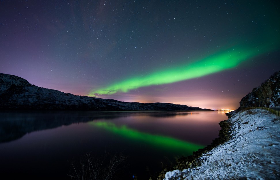 This file photo taken on November 12, 2015 shows the Aurora Borealis, or Northern Lights illuminating the night sky near the town of Kirkenes in northern Norway. Photo: AFP
