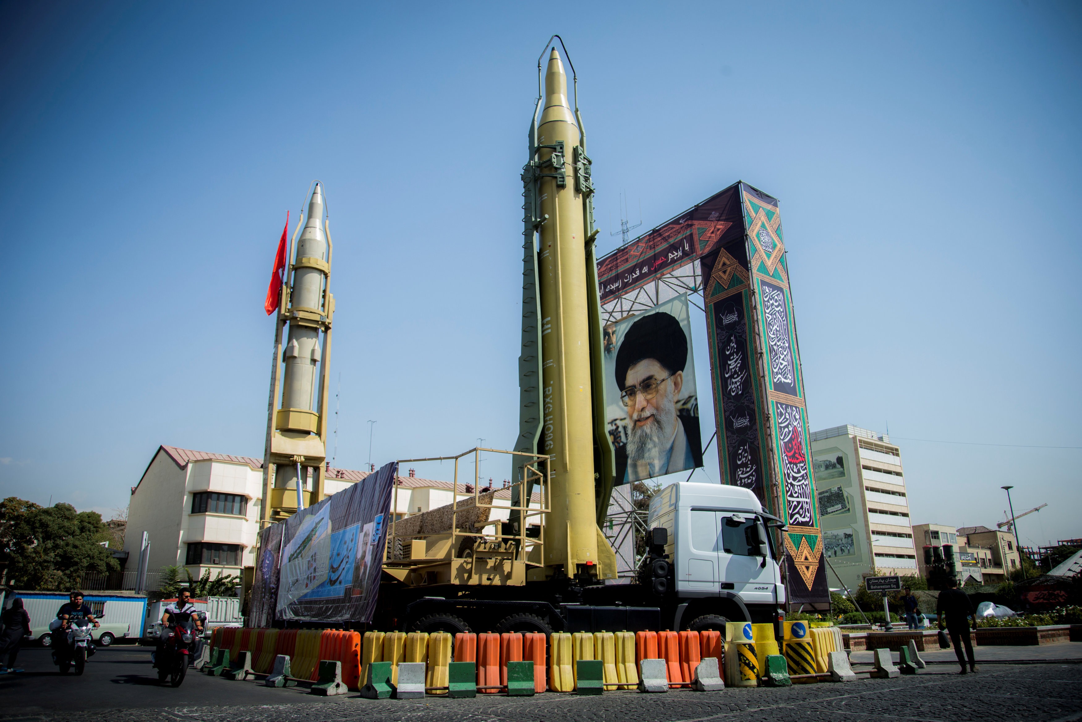 A display featuring missiles and a portrait of Iran's Supreme Leader Ayatollah Ali Khamenei is seen at Baharestan Square in Tehran, on September 27, 2017. Britain, France and Germany are discussing fresh sanctions against Iran to persuade the US not to abandon the nuclear deal with Tehran. Photo: TIMA via Reuters