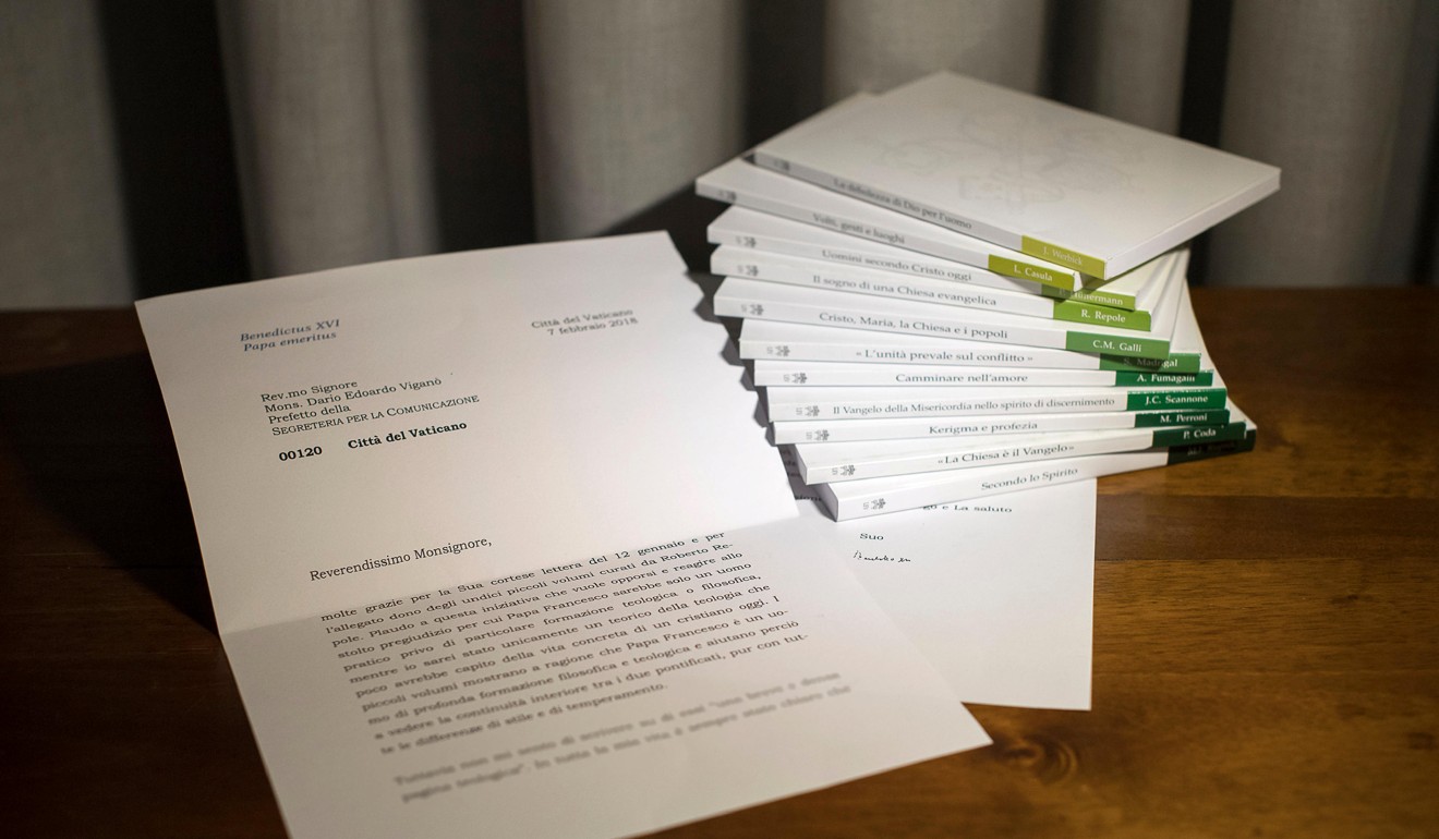 A series of 11 booklets on ‘The Theology of Pope Francis’ and a letter from former pope Benedict. Photo: Reuters