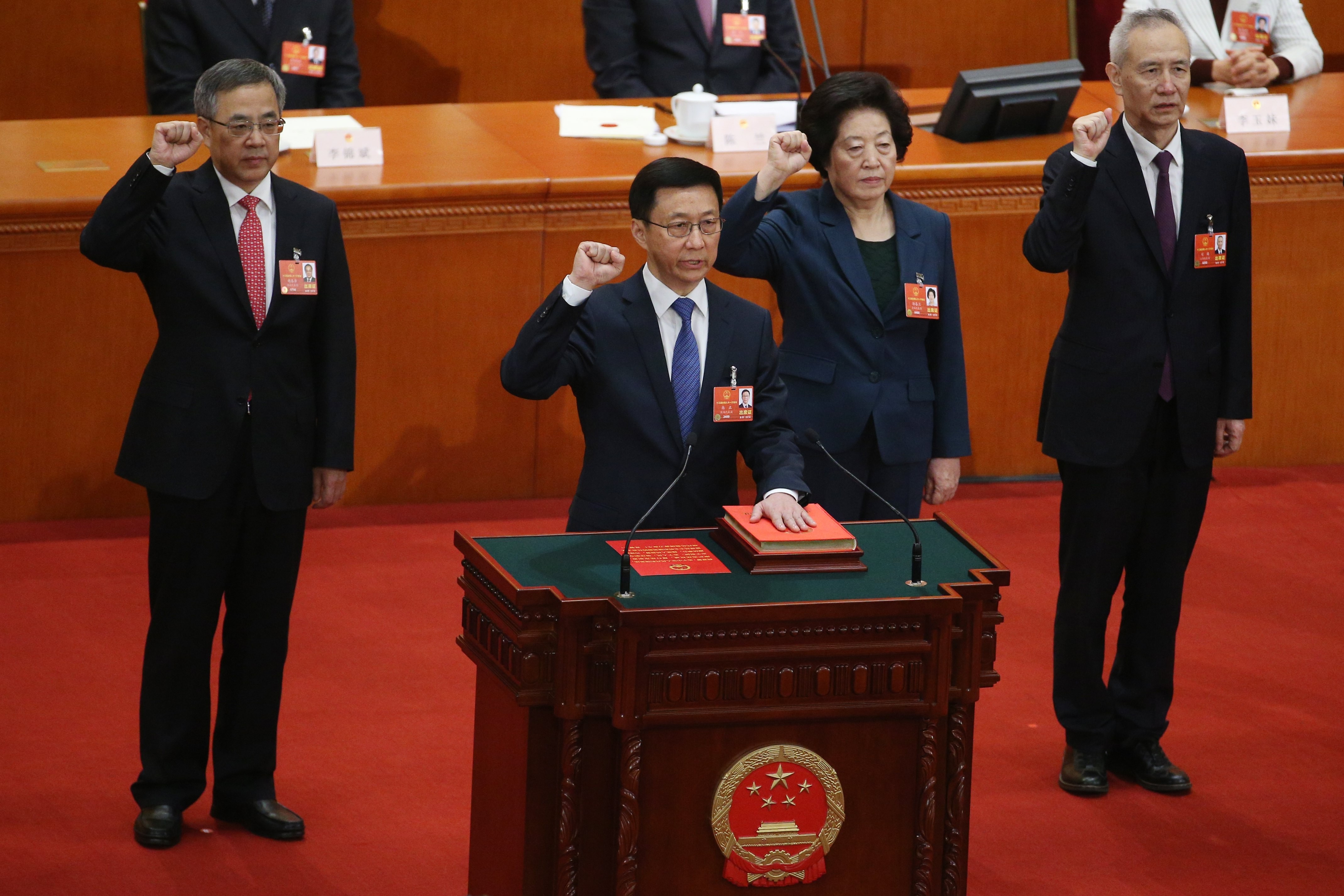 China’s four vice-premiers (from left) Hu Chunhua, Han Zheng, Sun Chunlan and Liu He swear an oath to the constitution at the National People’s Congress in Beijing on Monday. Photo: EPA-EFE