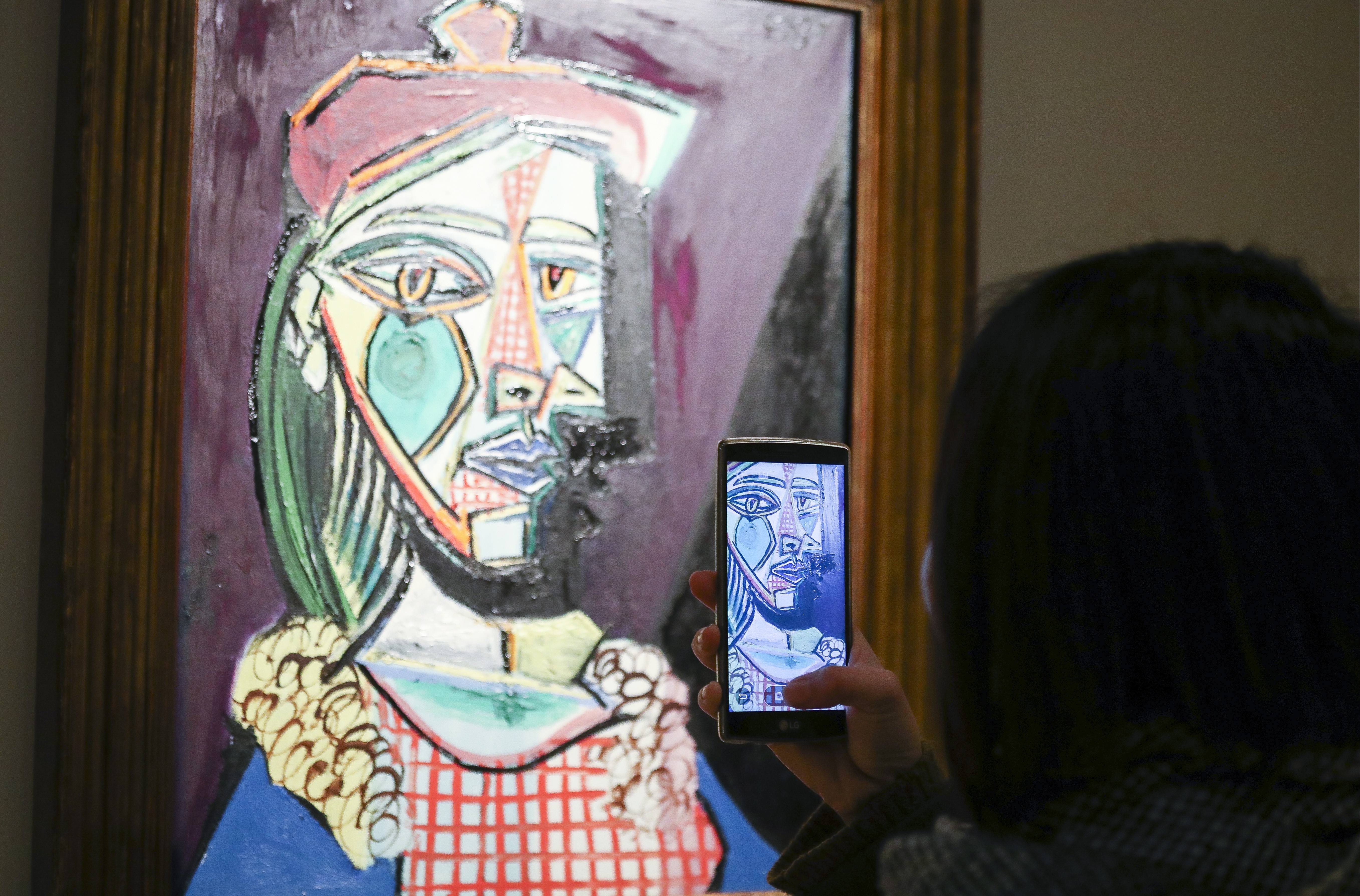 Pablo Picasso’s ‘Femme au béret et à la robe quadrillée (Marie-Thérèse Walter)’ at Sotheby's in Hong Kong. People looking to buy art want to go online for the transparency, says Brian Shipman, chief information officer at Heritage Auctions. Photo: Nora Tam