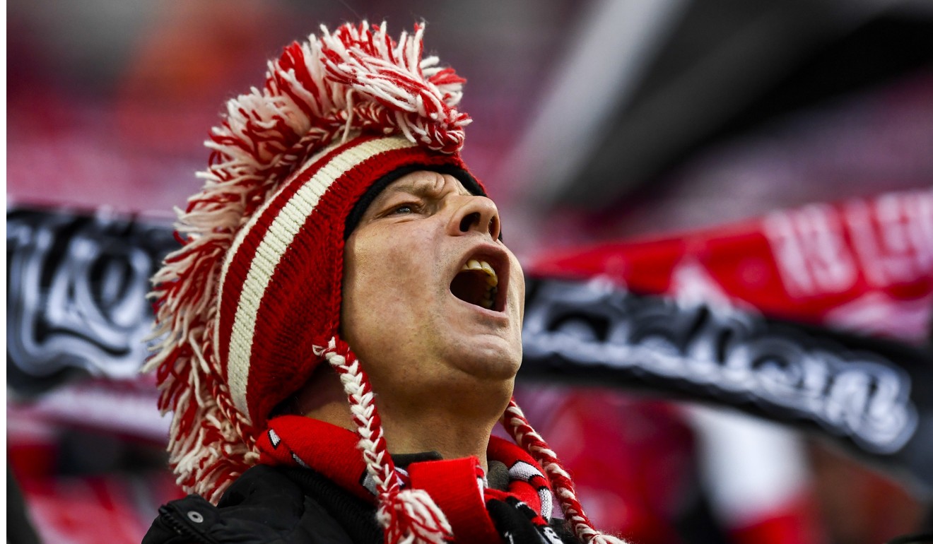 German football fans are largely against scrapping the controversial 50+1 rule. Photo: EPA