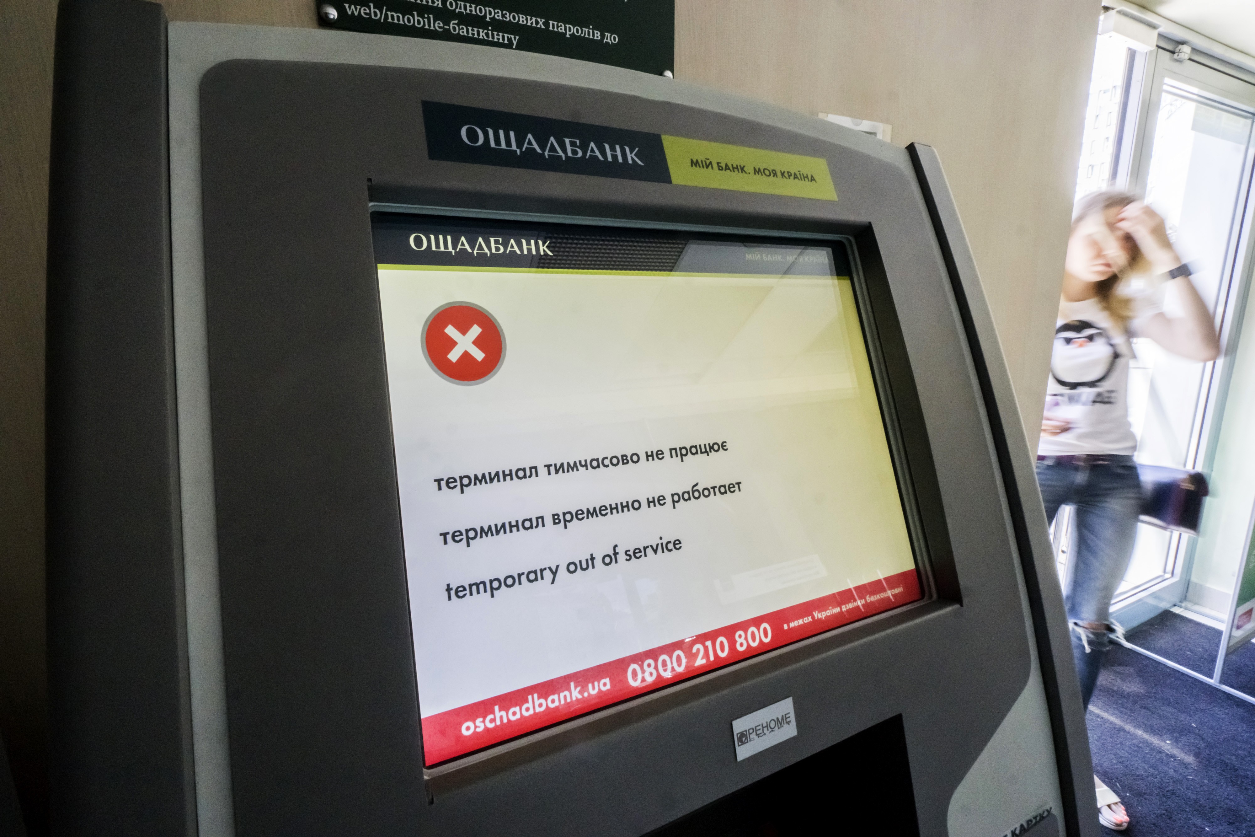 An “out of service” notice is displayed on the screen of an ATM at a bank infected by the Petya ransomware computer virus in Kiev in late June. The cyberattack, similar to WannaCry, began in Ukraine, infecting computer networks and demanding US$300 in cryptocurrency to unlock their systems before spreading to different parts of the world. Photo: Bloomberg