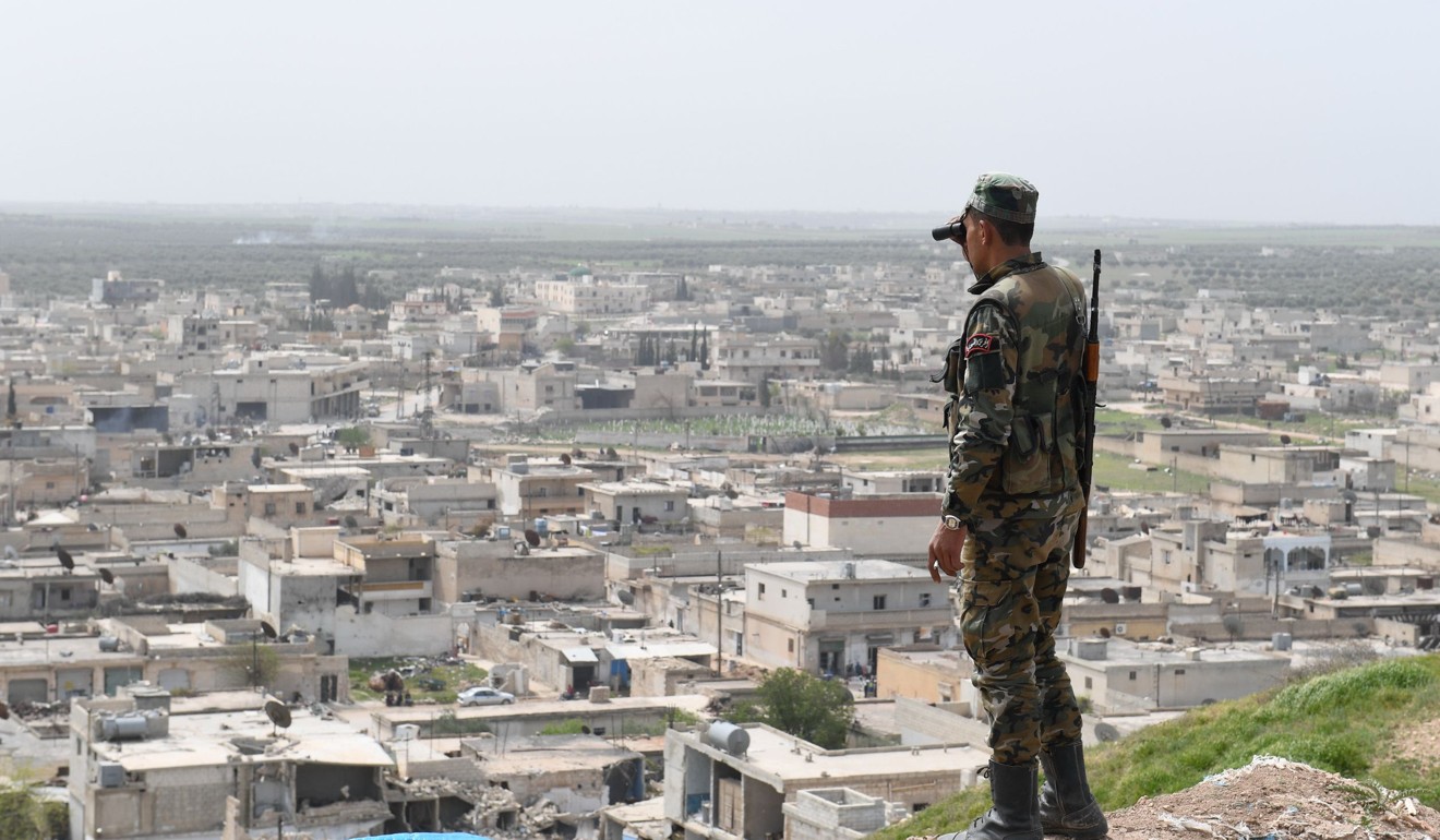 A Syrian government soldier stands guard in the northern Syrian town of Tal Rifaat on Wednesday. Photo: AFP