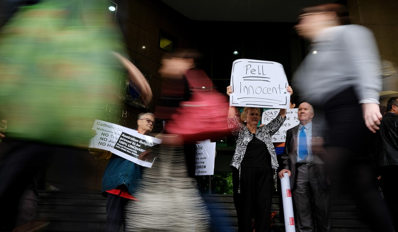 George Pell supporters outside the Magistrates Court in Melbourne. Photo: EPA