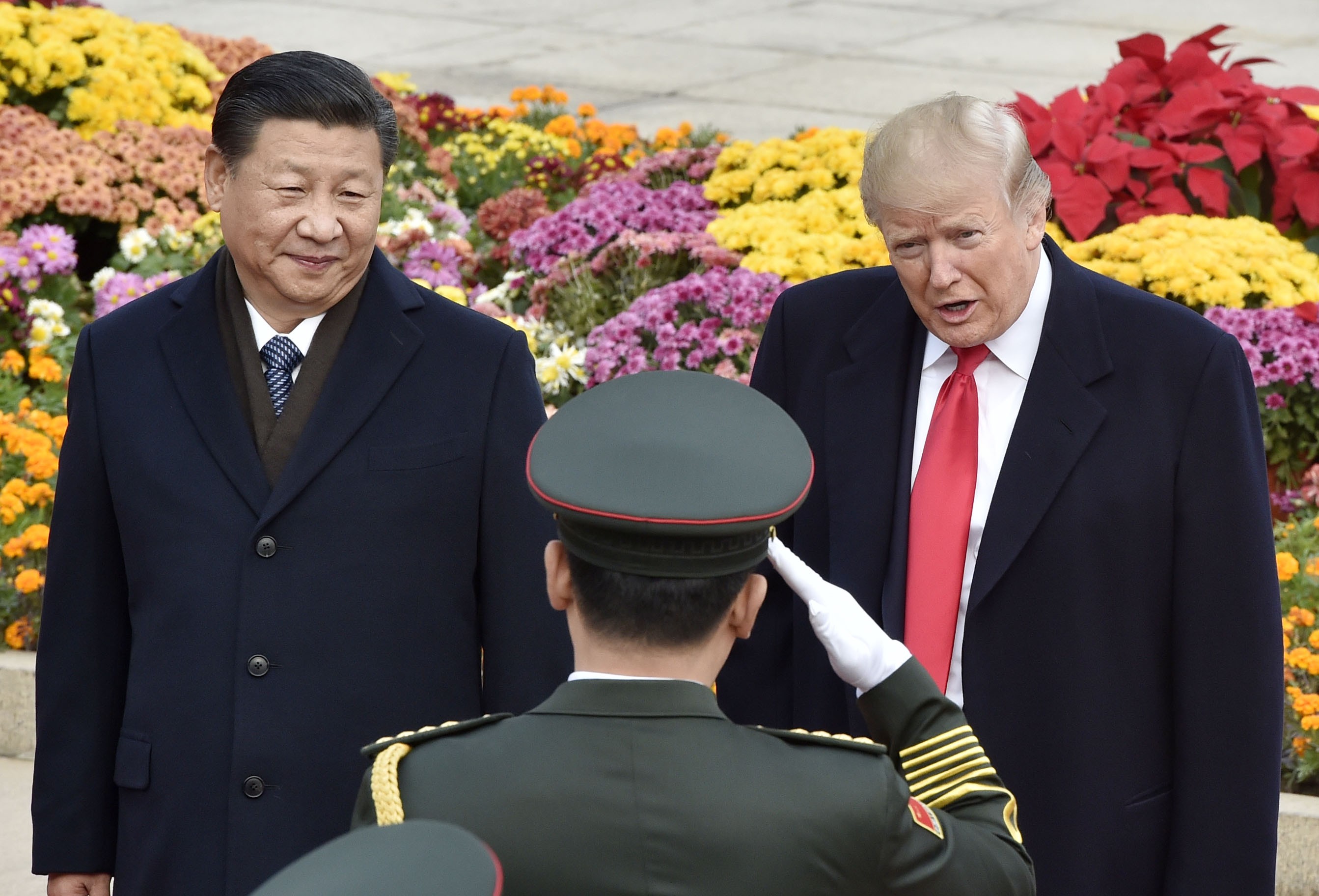 Chinese President Xi Jinping and US President Donald Trump attend a welcome ceremony in Beijing in November 2017. Photo: Kyodo