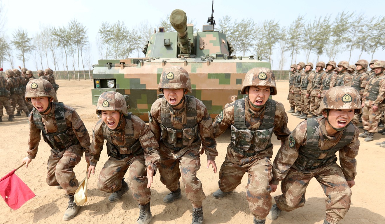 Soldiers from China's People's Liberation Army (PLA) are seen during a military promotional event in Baoding, Hebei province, China, on Monday. Photo: Reuters
