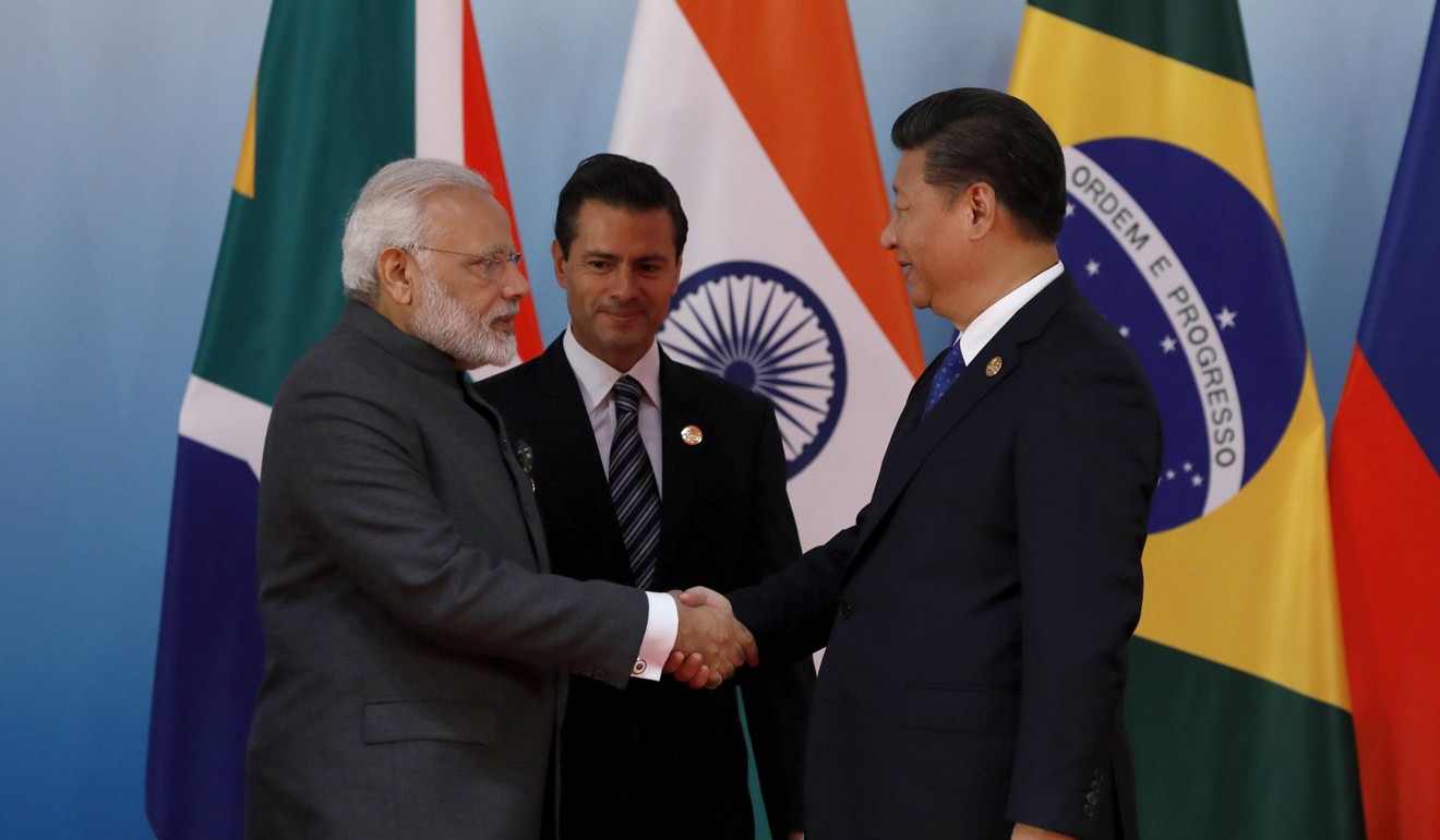 Chinese President Xi Jinping (right) greets Indian Prime Minister Narendra Modi (left) and Mexico's President Enrique Pena Nieto at the “Dialogue of Emerging Market and Developing Countries” on the sidelines of the 2017 BRICS Summit in Xiamen, in September 2017. Emerging-market equity funds have seen strong inflows in the first quarter of the year. Photo: EPA-EFE