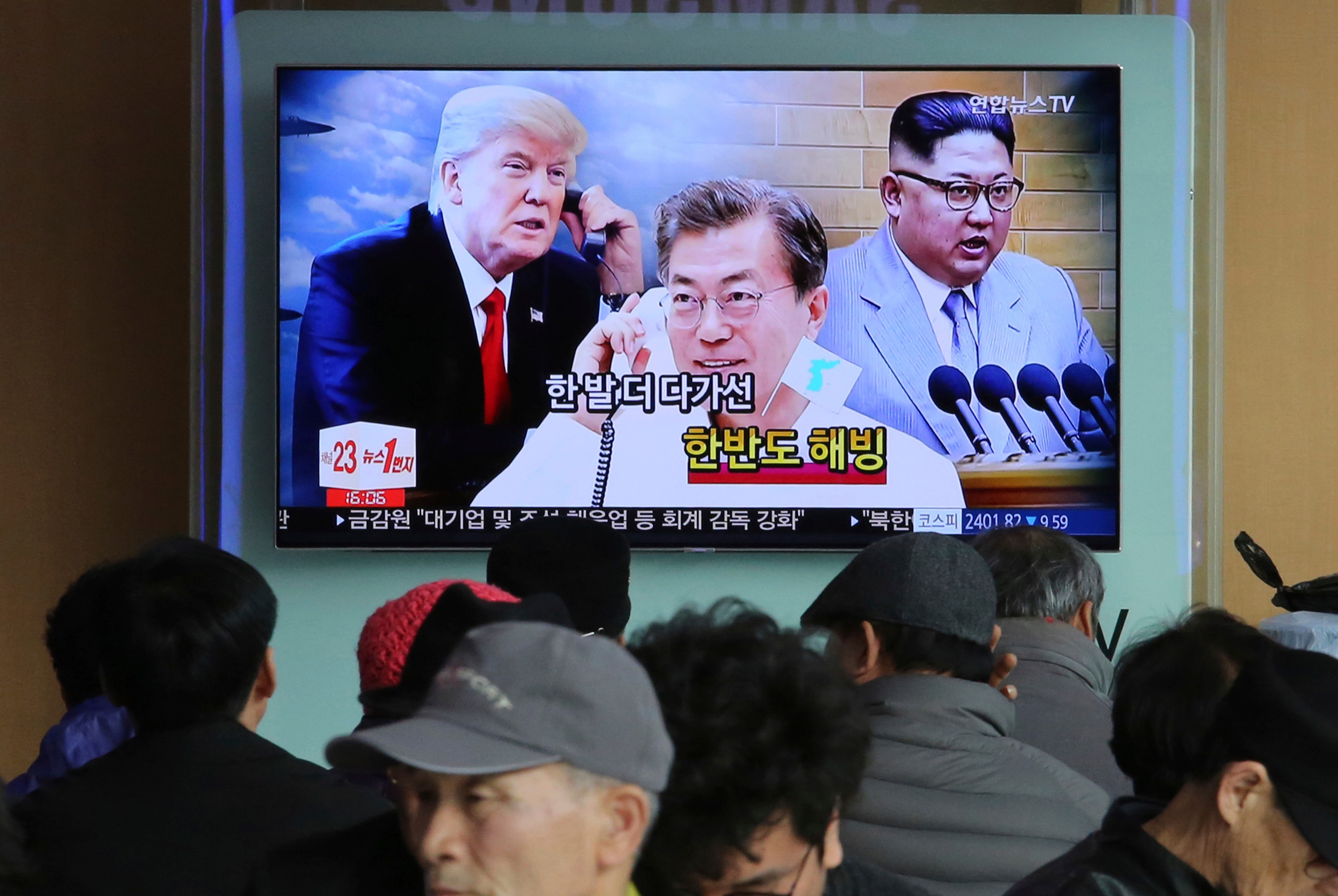 A TV screen at the Seoul Railway Station shows images of North Korean leader Kim Jong-un (right), South Korean President Moon Jae-in (centre) and US President Donald Trump in a news report, on March 7. Seoul, Washington and Beijing should focus on producing a settlement to the North Korean nuclear issue that is acceptable to all. Photo: AP
