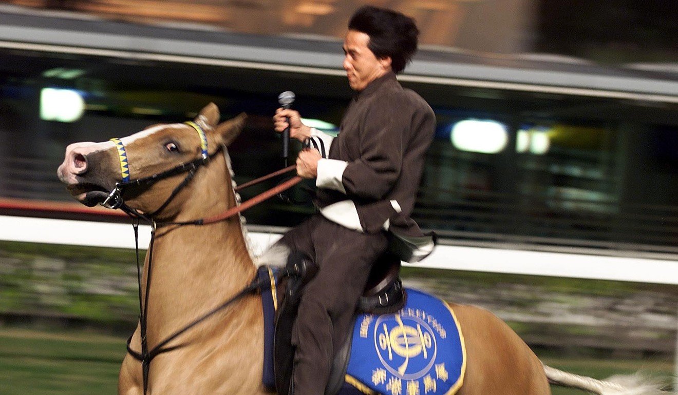 Chan goes for a ride at the Hong Kong Jockey Club, in 1999. Photo: AFP