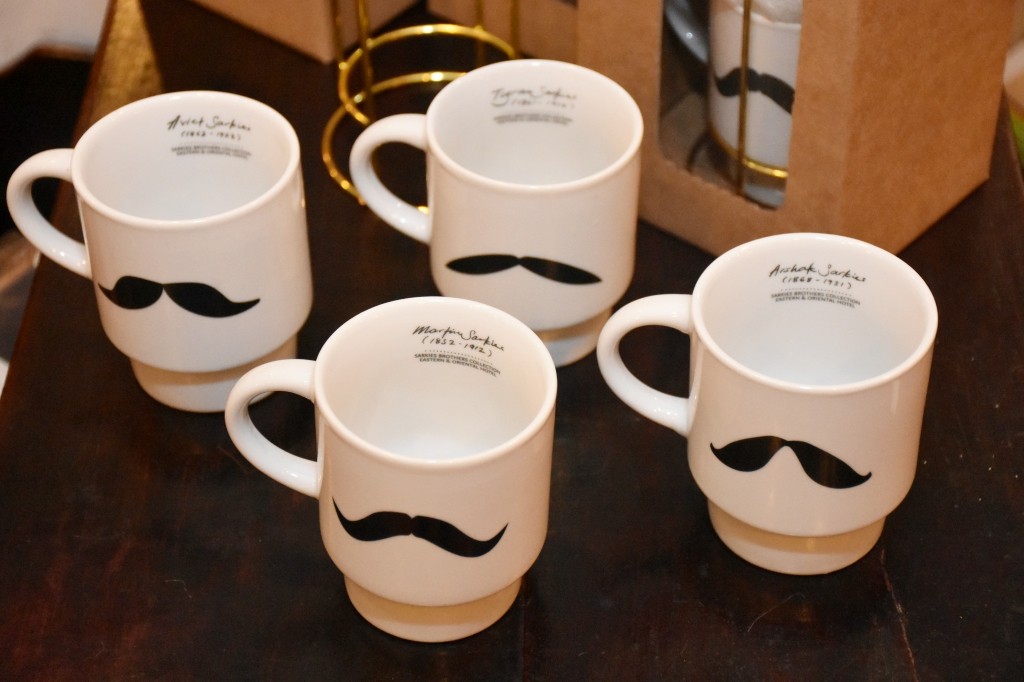 Mugs with the signature moustache of the Sarkies brothers from the E&O Hotel. Photo: Handout