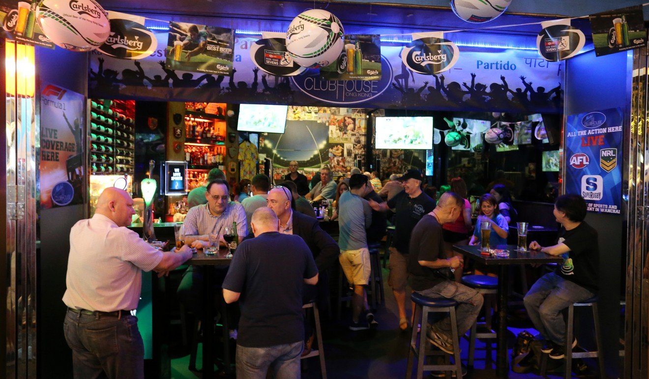Drinkers at Misty’s Clubhouse in Wan Chai during Hong Kong Rugby Sevens week. Photo: Dickson Lee