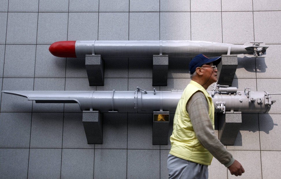 A man walks past a torpedo on display outside the Taiwan Armed Forces Museum in this file image. Taiwan is keen to upgrade its submarine fleet but needs US know-how to do so. Photo: Reuters