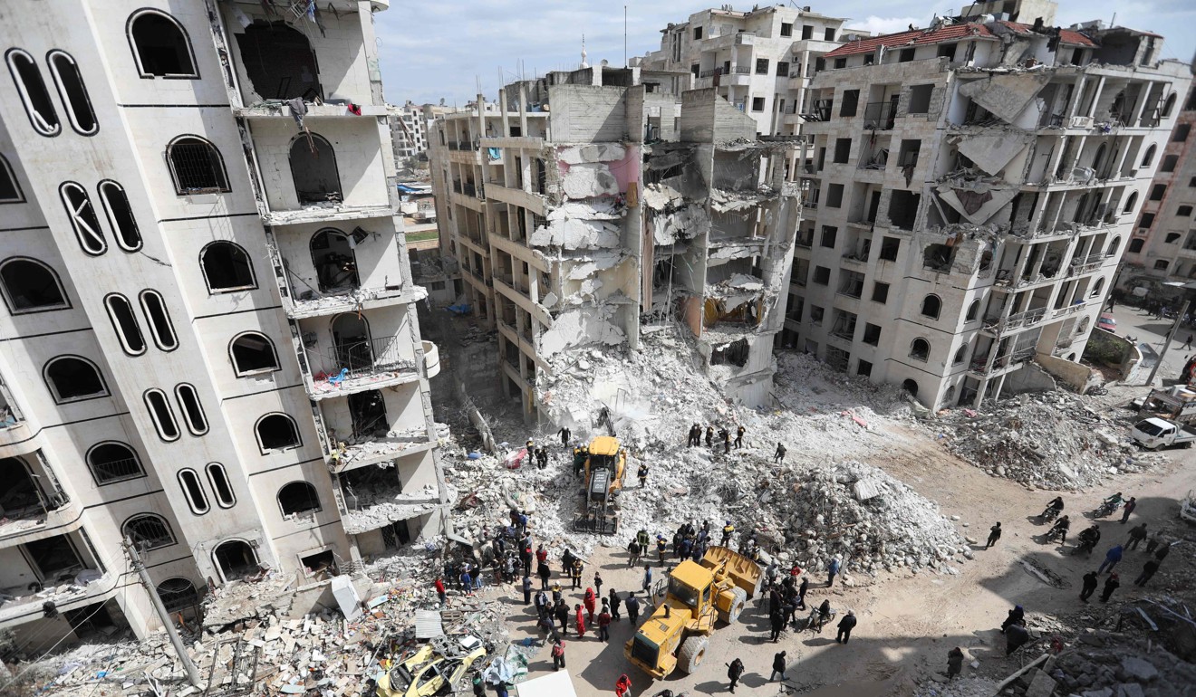 Syrian rescue teams clear the rubble at the site of an explosion in the war-battered country's northwestern city of Idlib on Tuesday. Photo: AFP