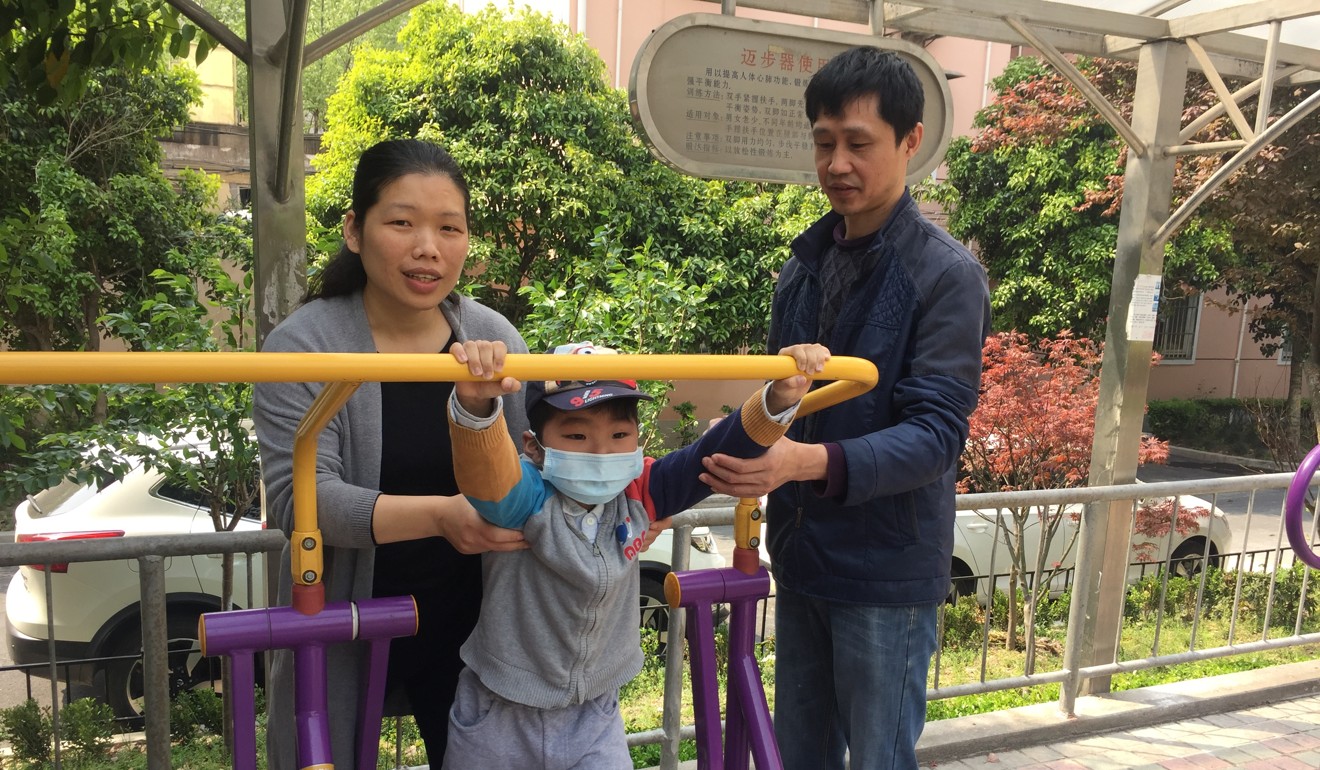 Fan Xiujuan and Gu Xingping have relocated twice in a quest to cure their son. Photo: Alice Yan
