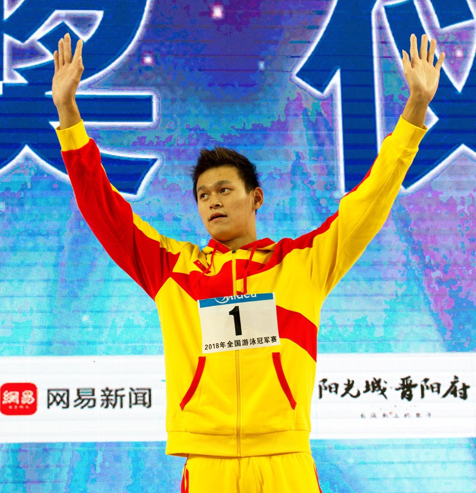 Sun Yang celebrates on the podium in Taiyuan, Shanxi. Photo: Xinhua