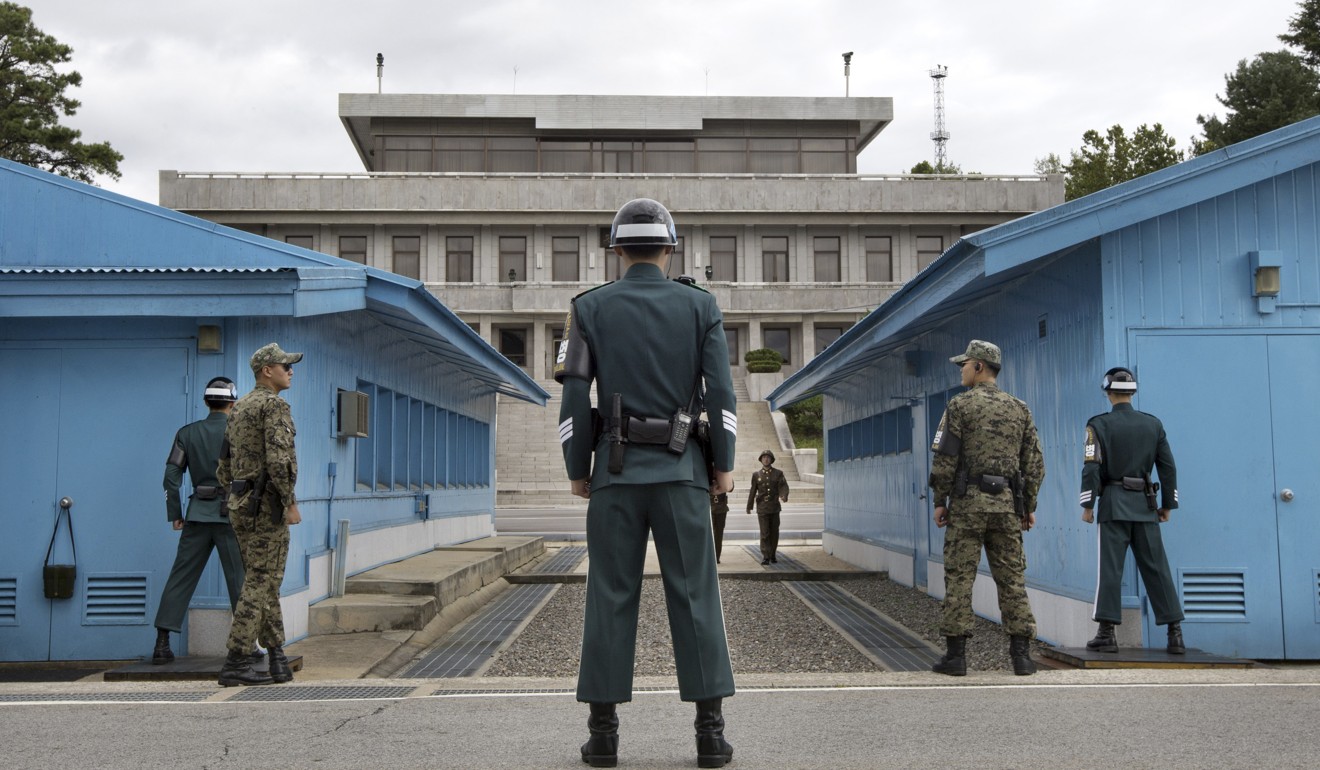 South Korean soldiers look towards the North Korean side of the border at the Demilitarised Zone. Photo: AFP