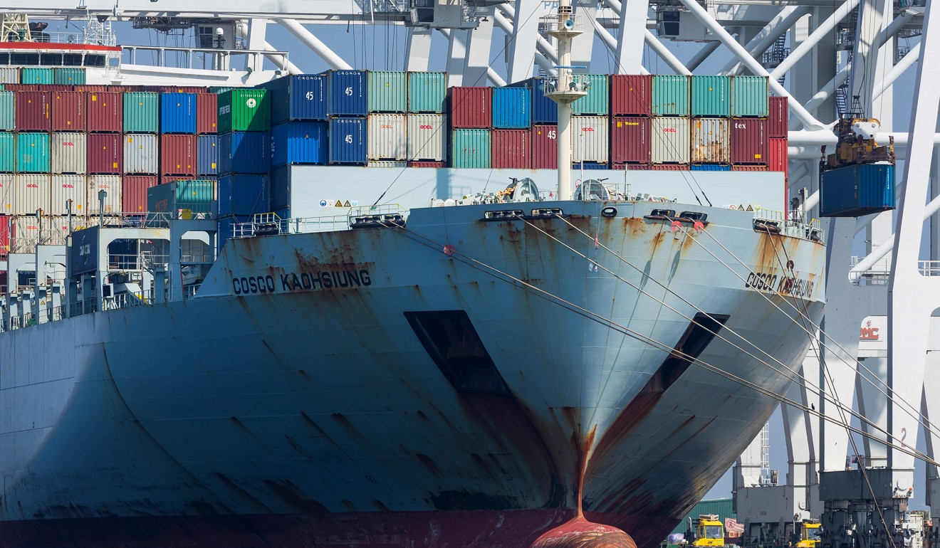 Containers stacked on top of a Cosco ship at the Port of Long Beach in California. US lawmakers expressed opposition to the company’s planned takeover of a Hong Kong firm that has the long-term lease at the Long Beach port. Photo: Bloomberg