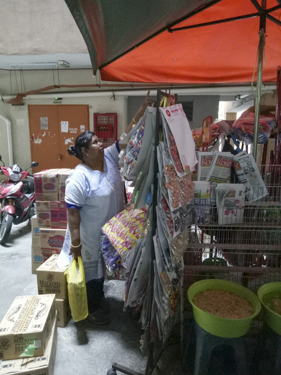 Minachi Munianday, 48, owns a grocery store on the ground floor of a high-rise public housing compound in Setapak, Kuala Lumpur. Photo: T.K. Letchumy Tamboo