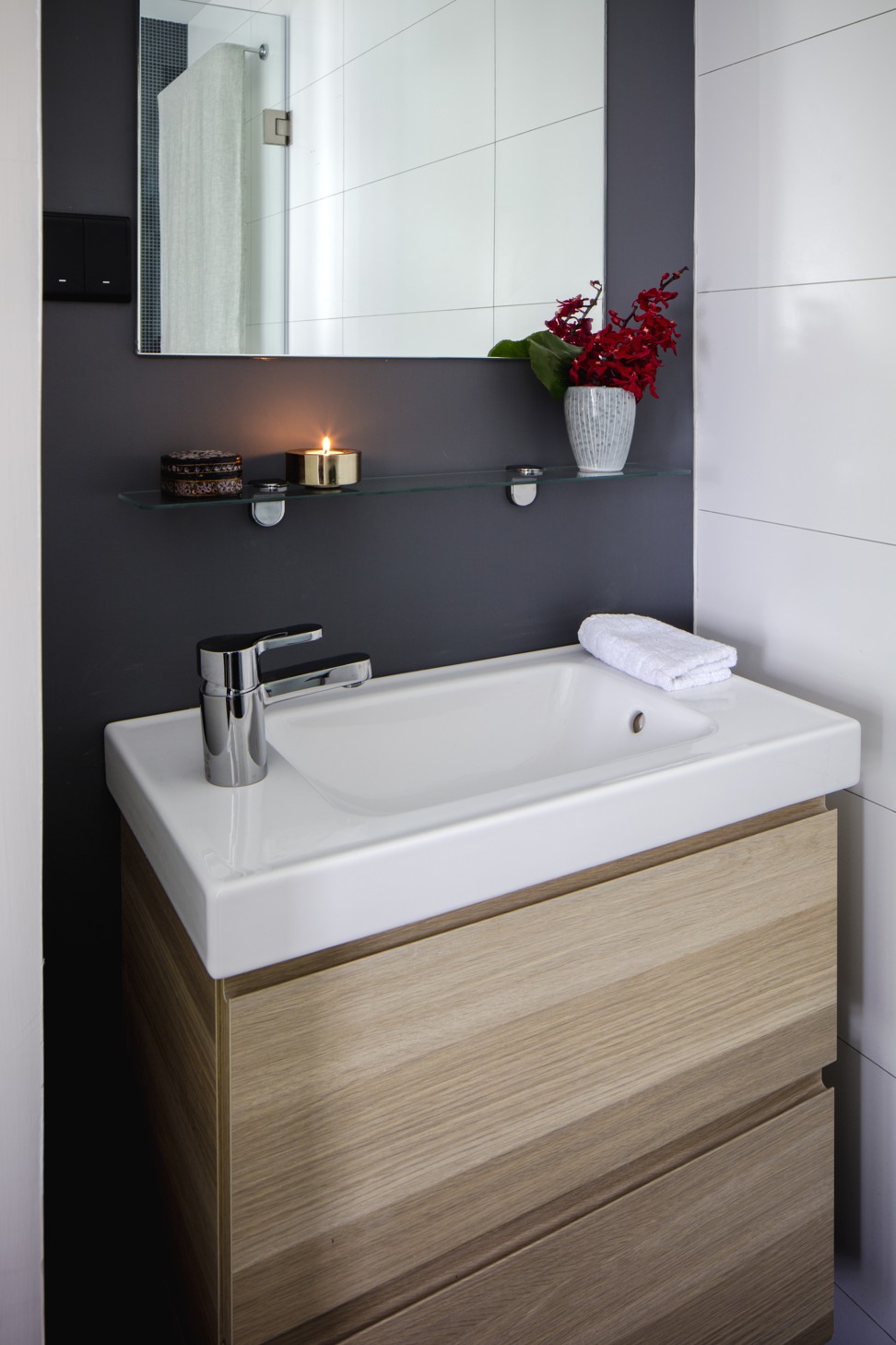 Installing a sink with a shallow depth gives the bathroom an additional sense of space.
