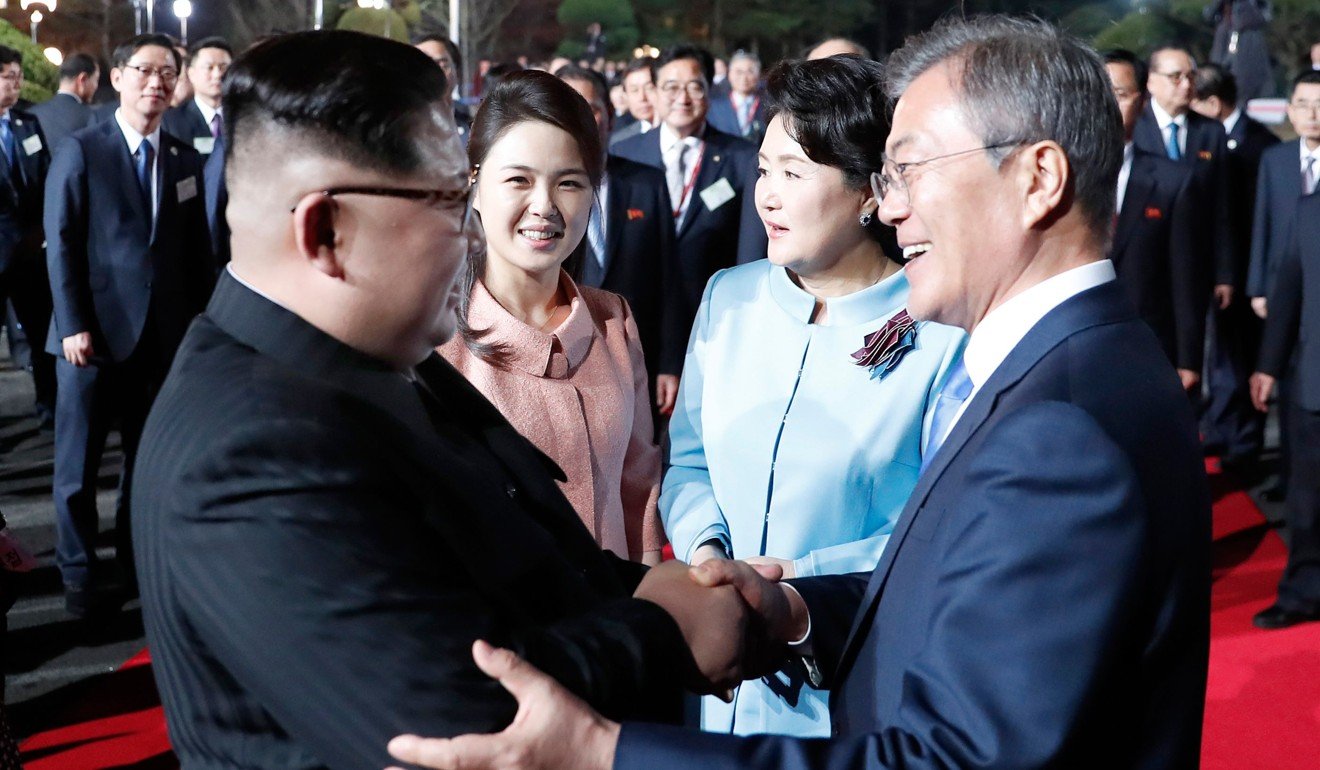 North Korean leader Kim Jong-un (left) with South Korean President Moon Jae-in at the end of their landmark summit in Panmunjom. Photo: AFP