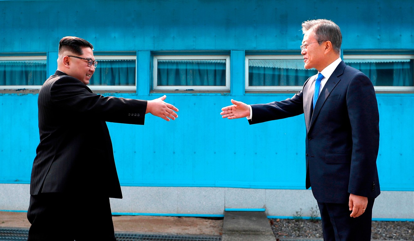 North Korean leader Kim Jong-un and South Korean President Moon Jae-in at the military demarcation line in the demilitarised zone. Bringing peace to the Korean peninsula has emerged as a priority for the Trump White House. Photo: AP
