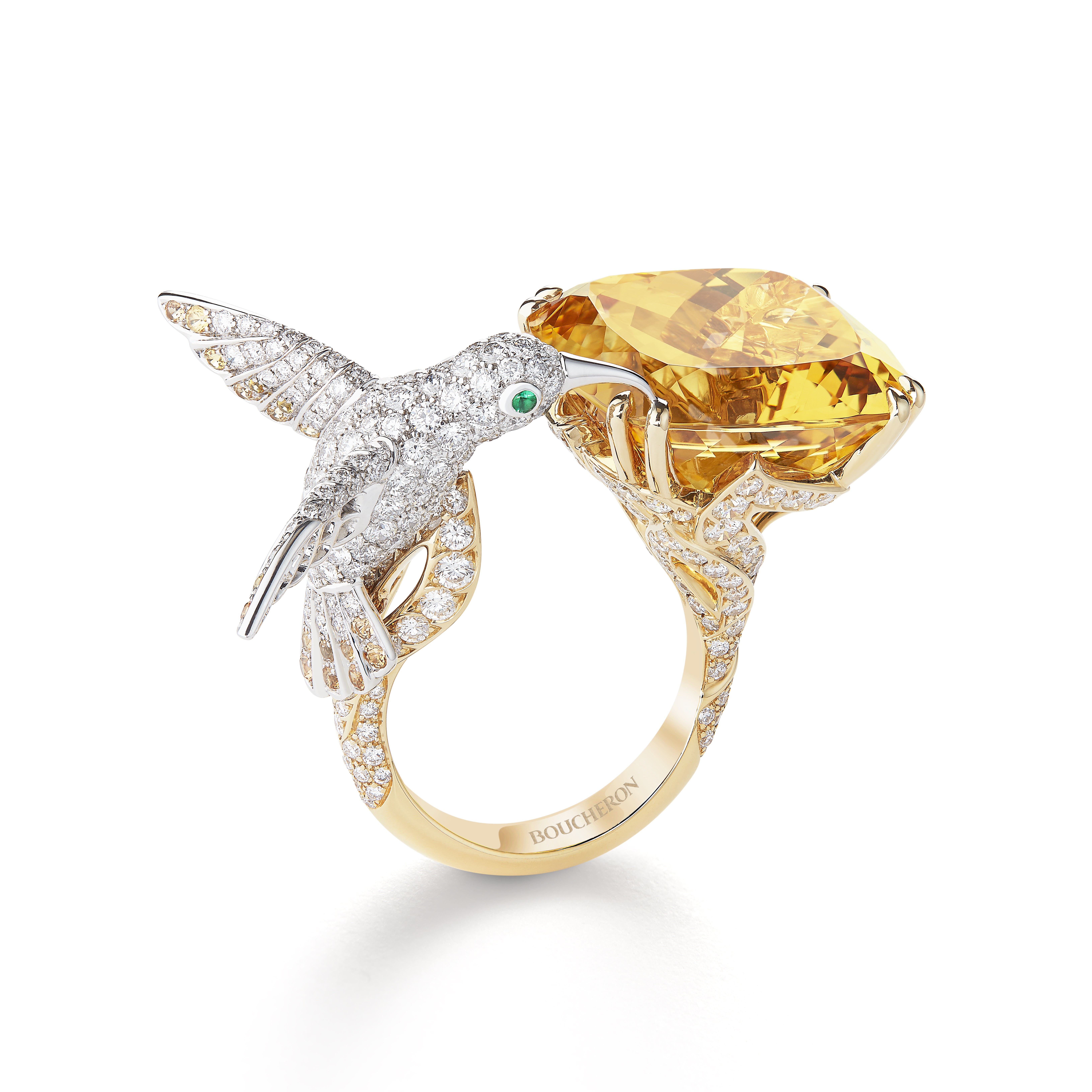 Boucheron. The shimmering white and yellow gold hummingbird ring, set with a yellow beryl, emeralds, sapphires and diamonds, adds some glamour to your day. Price on request
