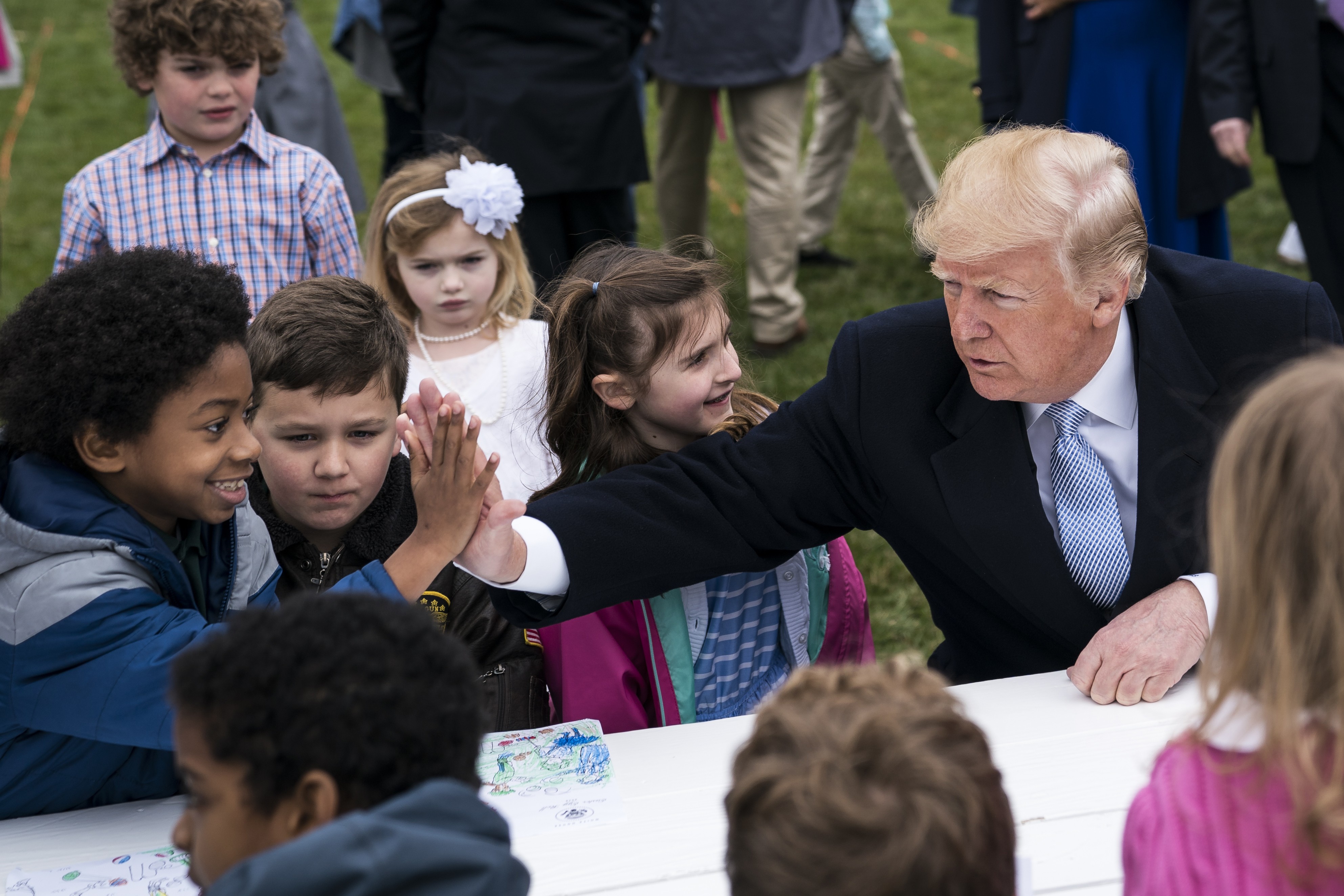 President Donald Trump greets children at the White House on April 2. Speculation is rife about Trump’s mental fitness for office. Photo: Washington Post 