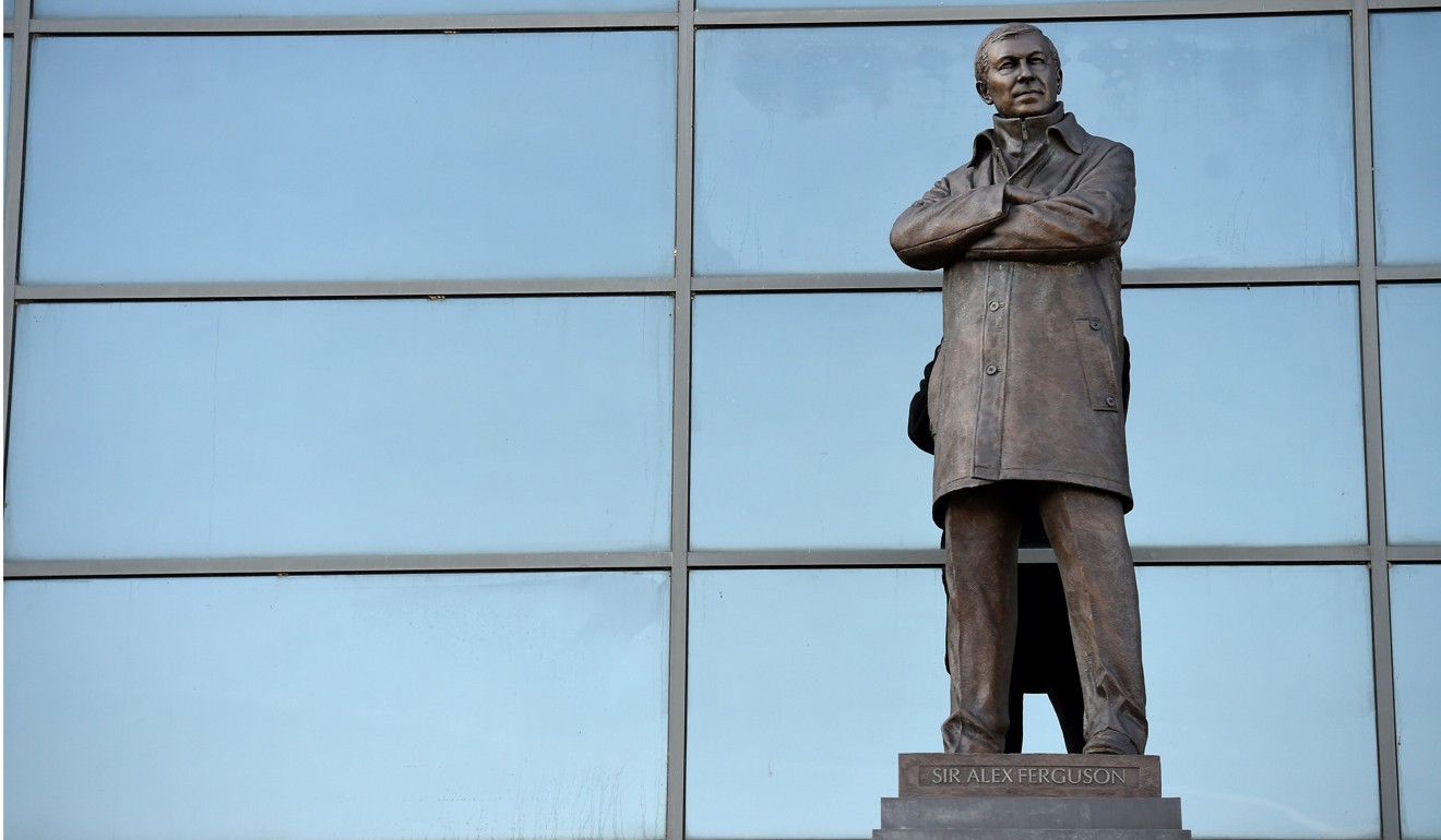 A statue of Alex Ferguson is pictured outside the Sir Alex Ferguson Stand at Old Trafford. Photo: AFP