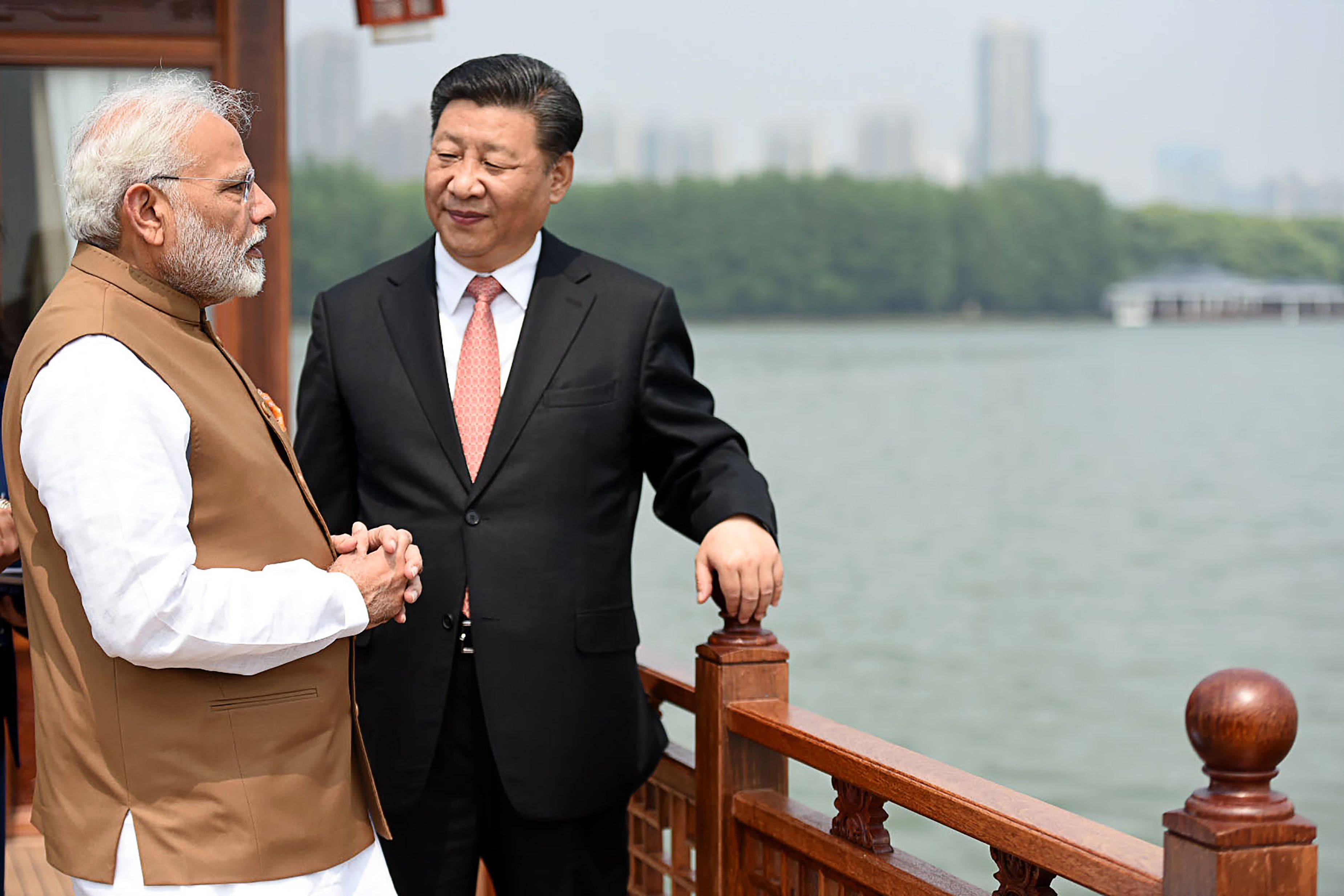 India's Prime Minister Narendra Modi and Chinese President Xi Jinping share a moment in Wuhan on April 28. Photo: AFP 