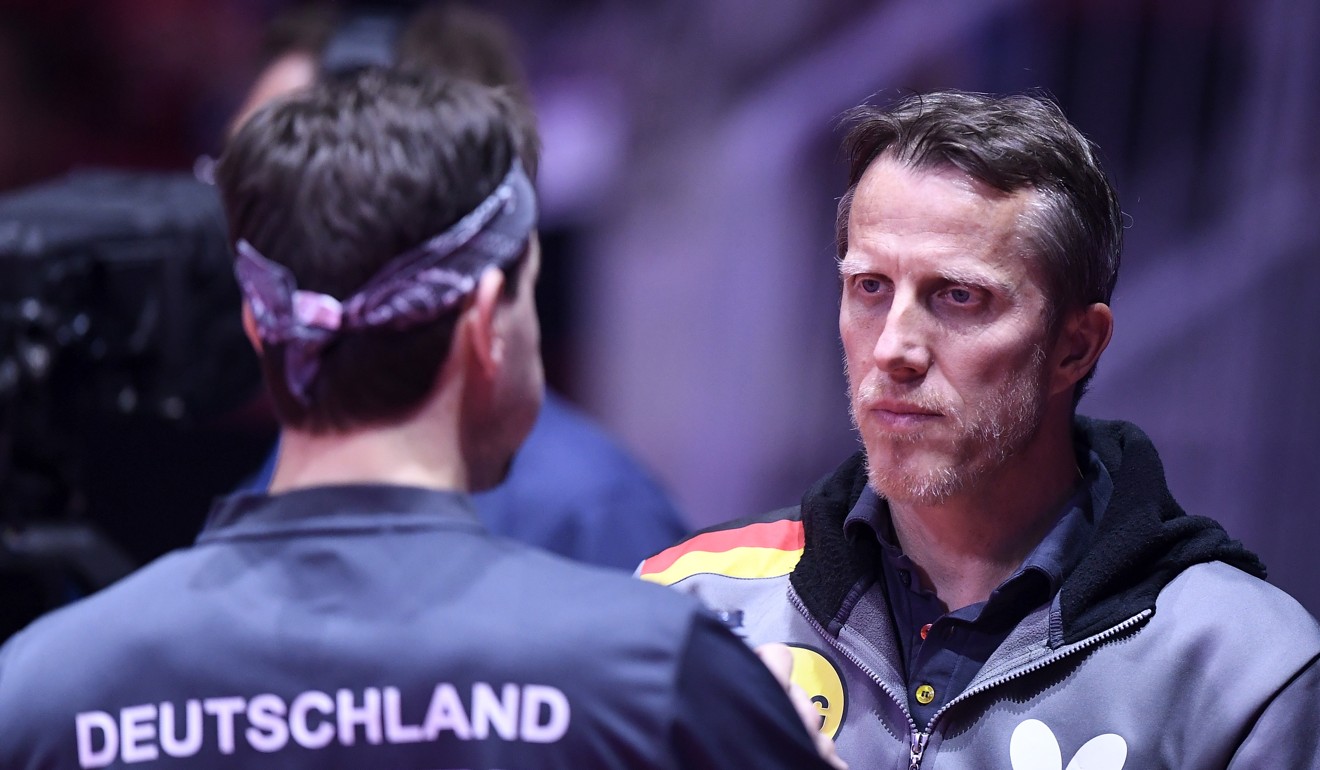 Germany coach Joerg Rosskopf (right) and Timo Boll.